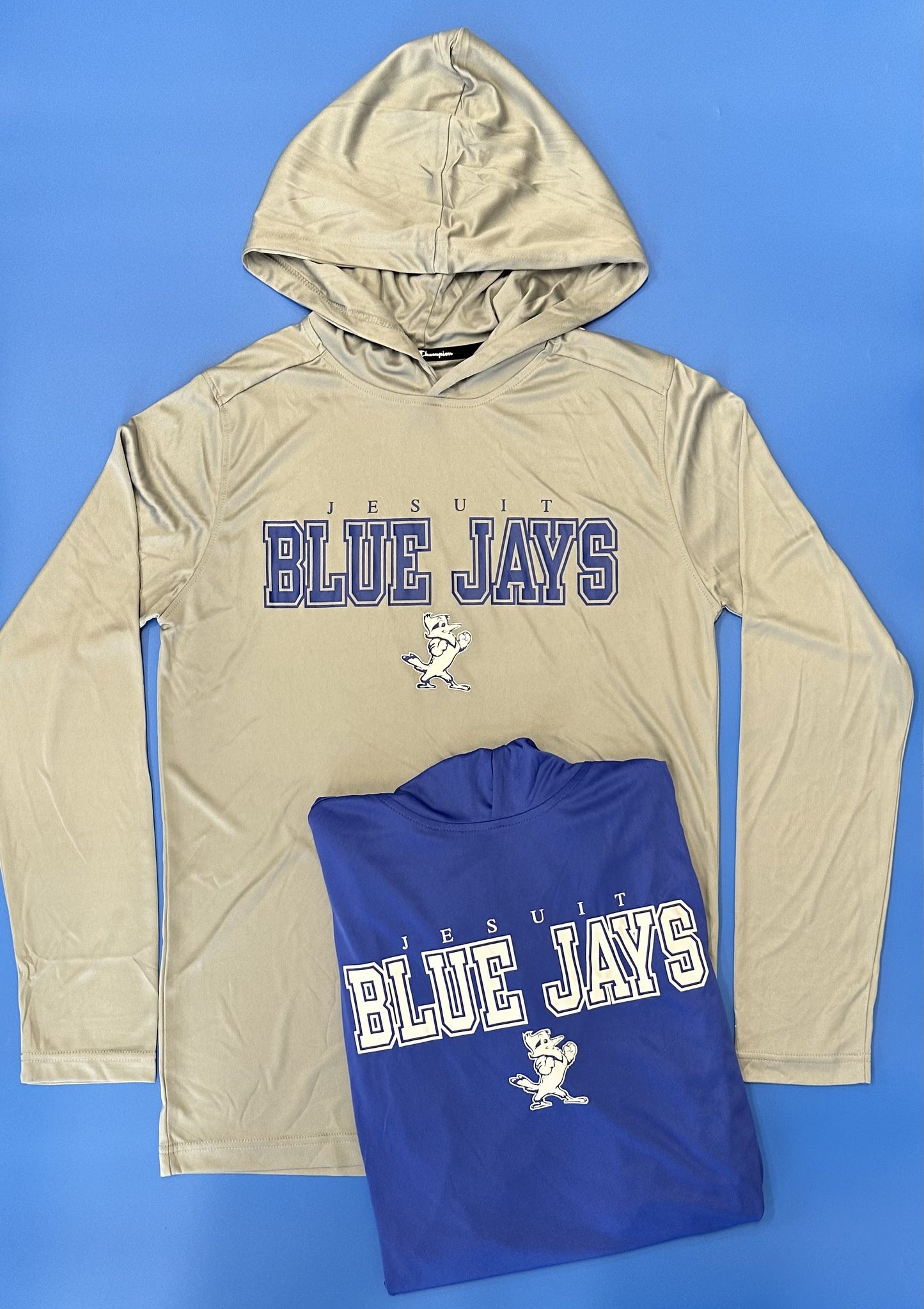 Champion. From the 2024 Stadium Collection. 100% Polyester. 2-piece self -lined hooded tee with set-in sleeve construction. Screen-printed Jesuit logos.