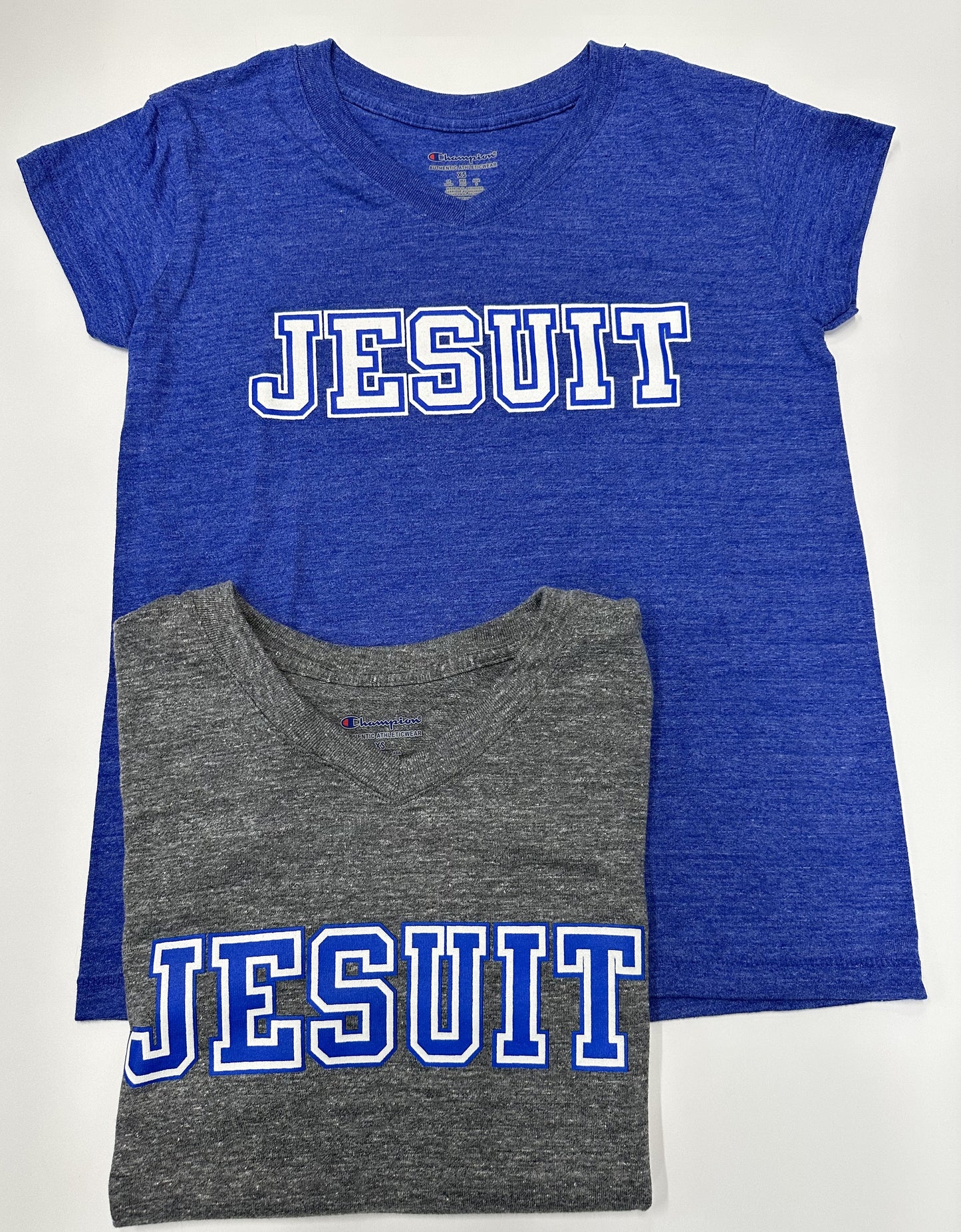 Champion. Tri-Blend: 50% Polyester/37% Cotton/13% Rayon Jersey. 1 x 1 rib at collar. Set in short sleeve & relaxed body.