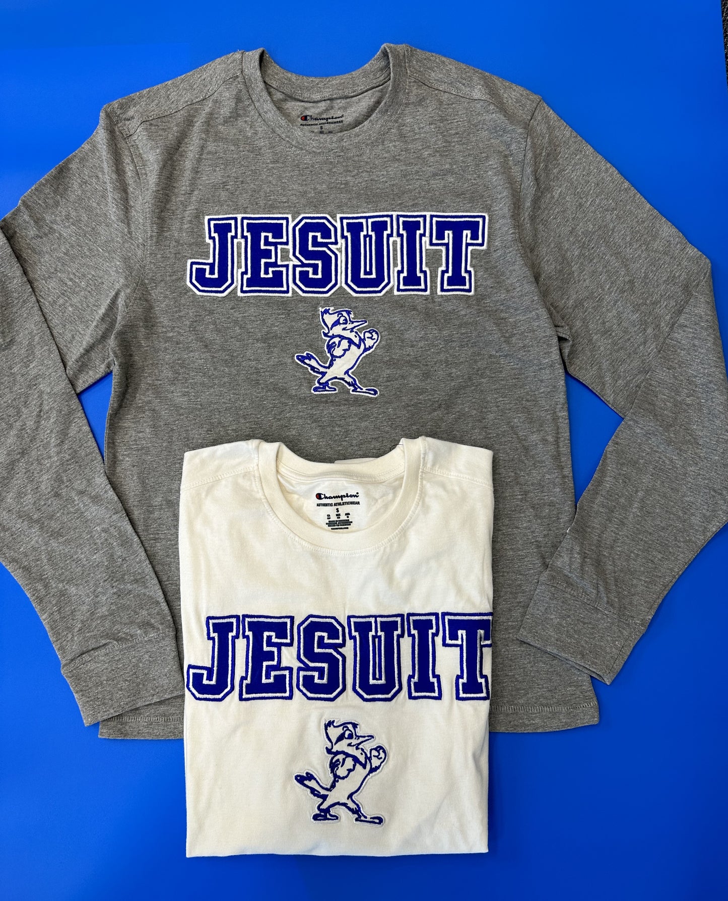 Champion. 100% Cotton. Tackle Twill Applique.