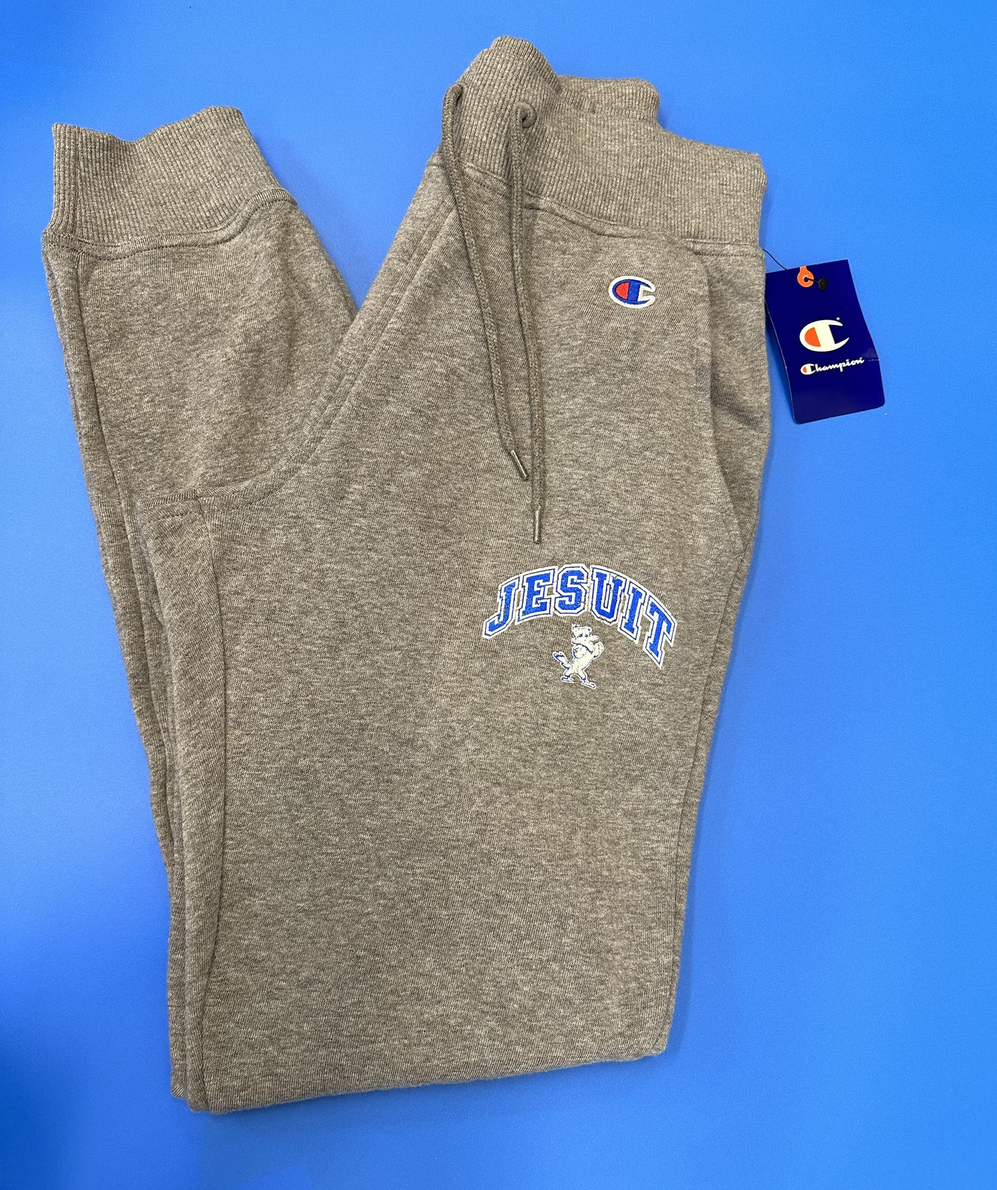 Champion. 47% polyester/39% cotton/14% rayon fleece. 2 x 2 rib at cuffs & waistband Classic fitting jogger w/drawcord at waist. Hand pockets with jersey pocket bags.