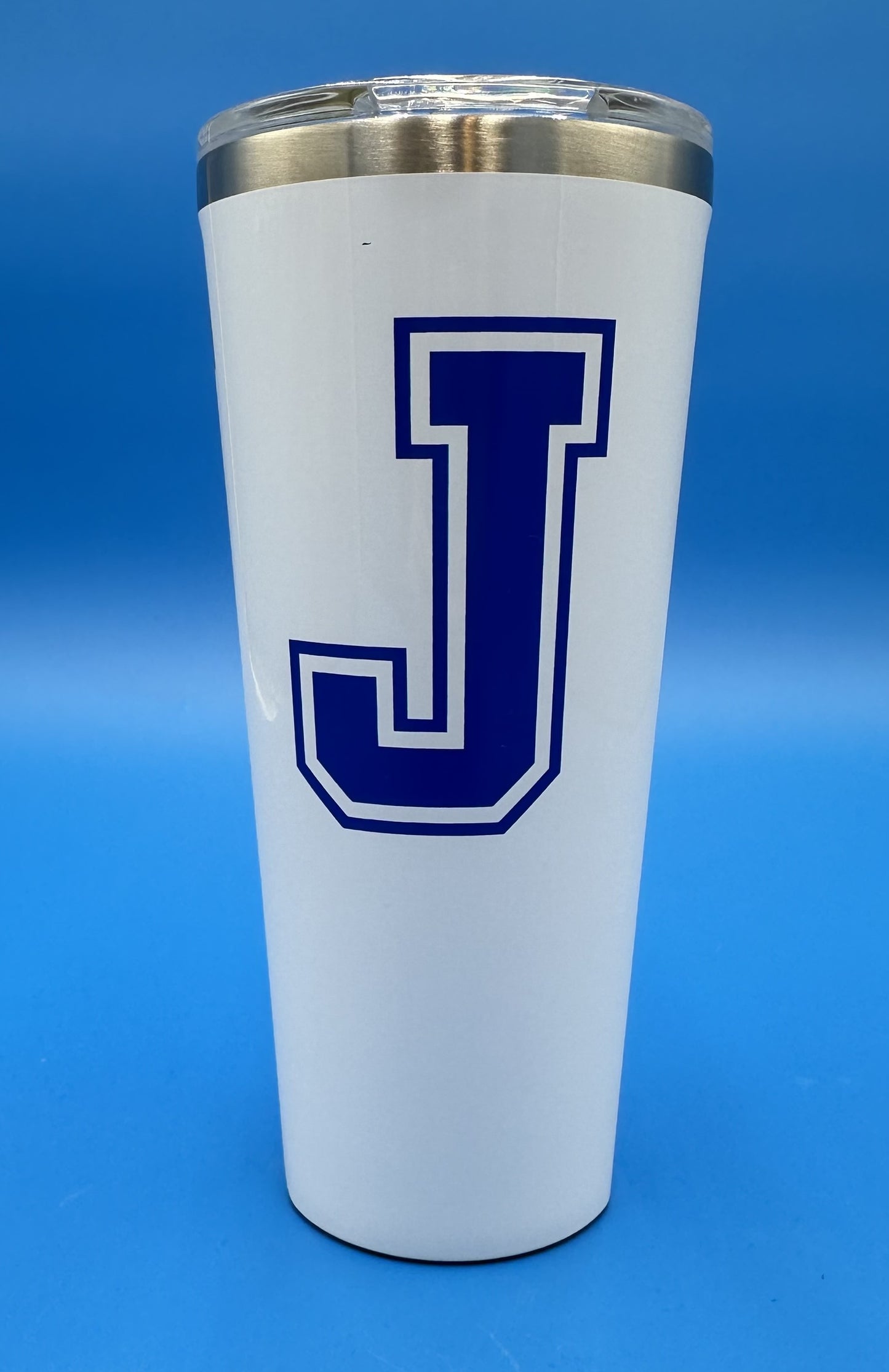 Corkcicle 24 ounces. Triple Insulated. Easy-Grip Sides. Stainless Steel. 9 hours cold/3 hours hot. J logo. Top Rack Dishwasher Safe.BPA Free.