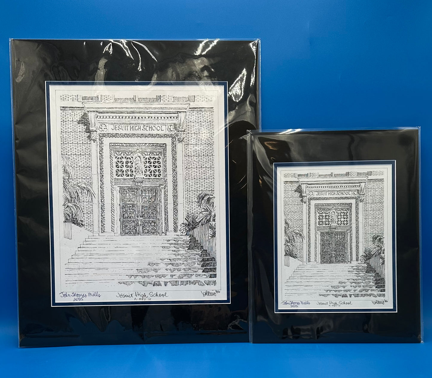 Artist William "Billy" Harris Class of '86.
Personalized signature of your graduating student by artist on these pen and pencil drawings of the Chapel of the North American Martyrs and the front doors of Jesuit High School. Artwork is double matted - Royal Blue interior and Black exterior. Easily fits in ready-made frames.
When ordering:
Provide Graduate's name - maximum is 18 characters per name (including spaces). Choose black pencil OR blue pen.