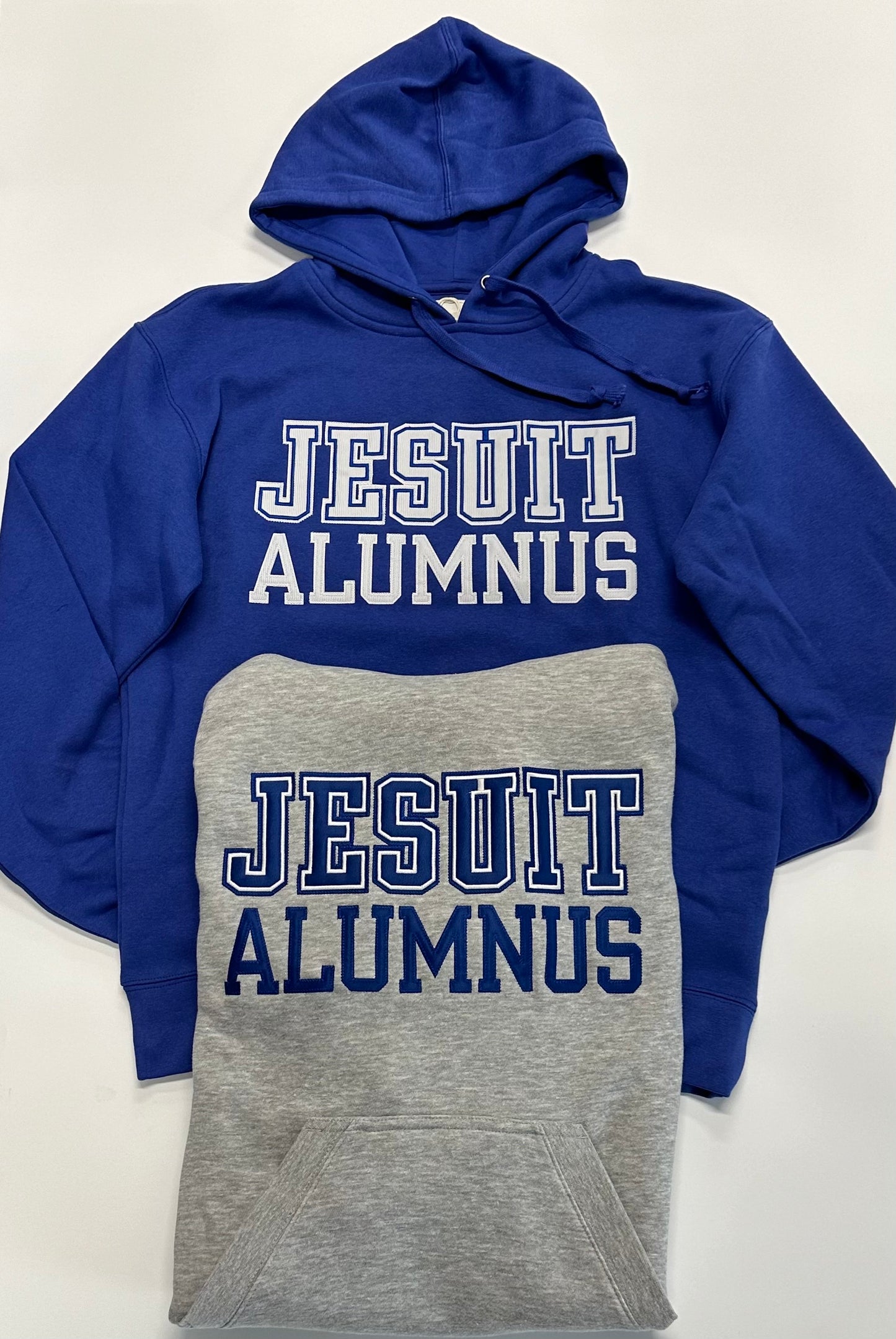 Gear for Sports. Made with 80% Cotton/20% Polyester 9 oz. fleece. The Big Cotton Hood is brushed inside and out for the coziest fit and feel and is sure to become a new favorite wardrobe essential. Includes a jersey lined hood with draw cord and front pouch pocket, 1x1 Cotton/Spandex rib at cuff, waistband, and pocket openings. JESUIT ALUMNUS embroidered logo.