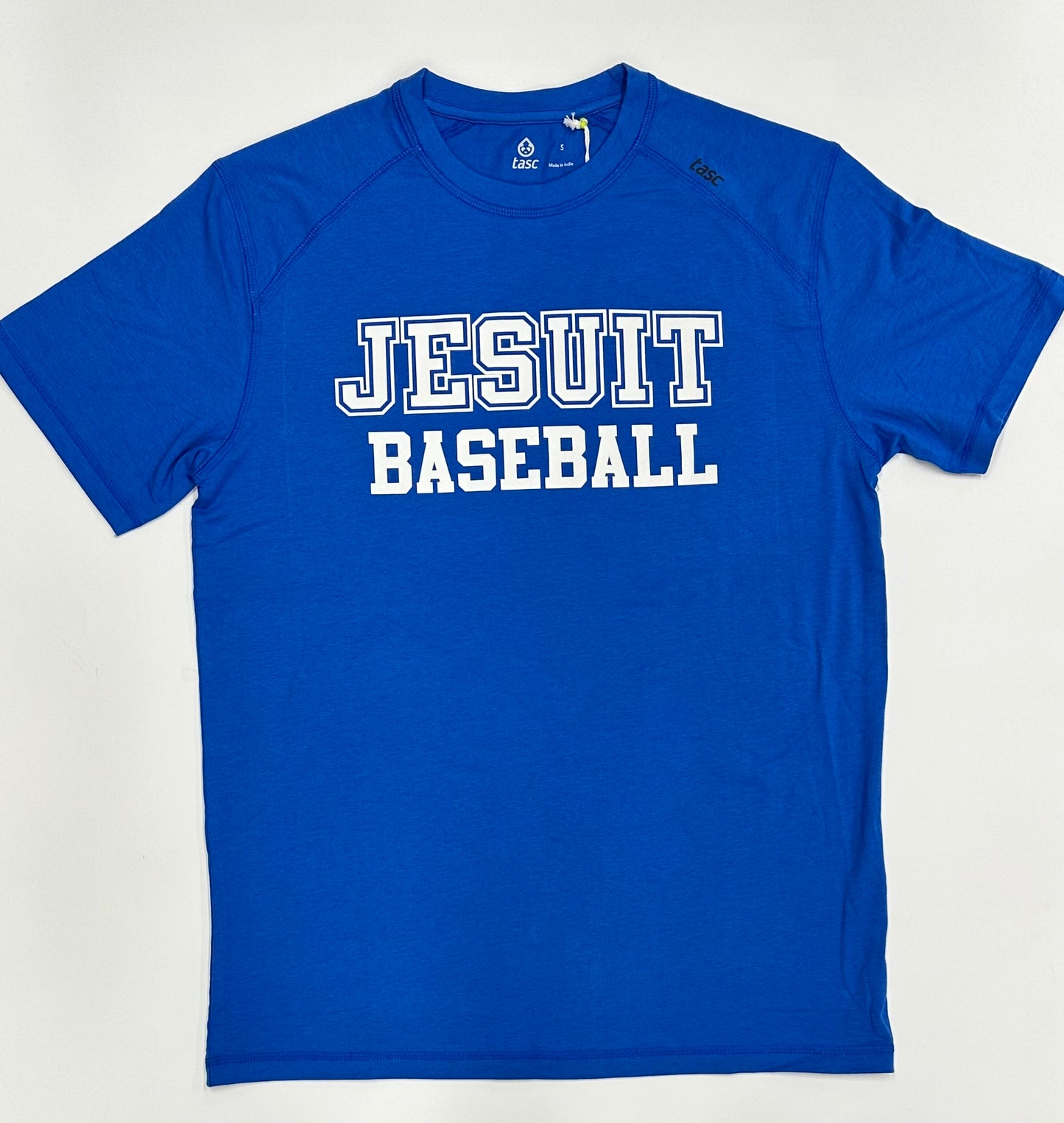 Tasc Performance.
The shirt that started this New Orleans brand!
Lightweight performance fabric for year-round comfort, modified raglan shoulder, 30" length.
52% Organic Cotton/43% Viscose from Bamboo/5% Lycra Spandex.
Jesuit BASEBALL logo.
