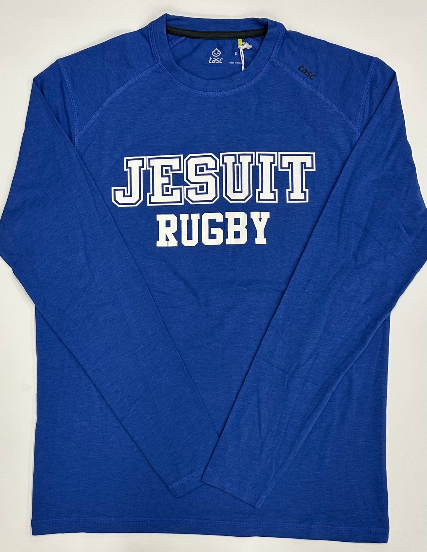 Tasc Performance.
Lightweight performance fabric for year-round comfort, modified raglan shoulder, 30" length.
52% Organic Cotton/43% Viscose from Bamboo/5% Lycra Spandex.
Jesuit RUGBY logo.