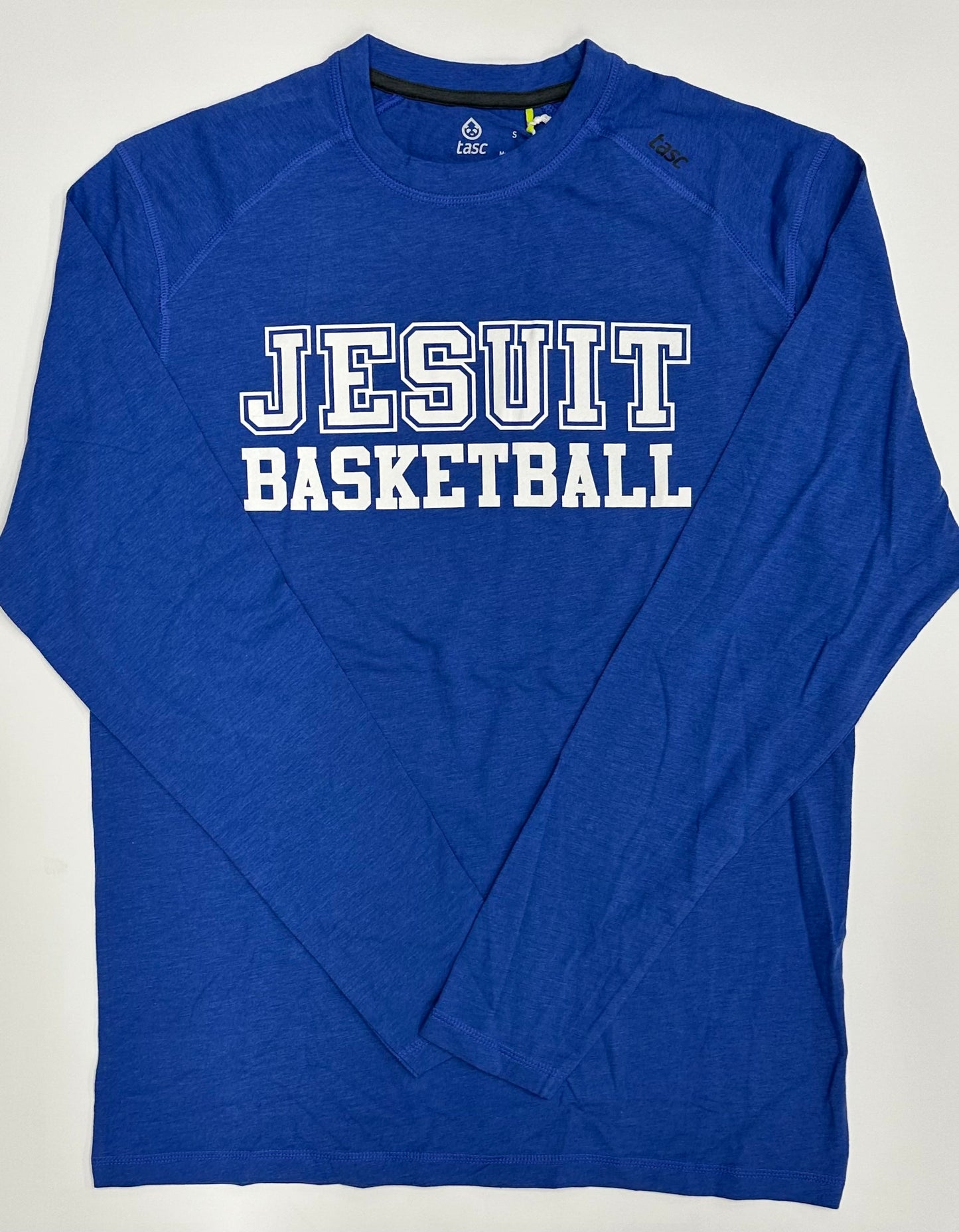 Tasc Performance.
Lightweight performance fabric for year-round comfort, modified raglan shoulder, 30" length.
52% Organic Cotton/43% Viscose from Bamboo/5% Lycra Spandex.
Jesuit BASKETBALL logo.