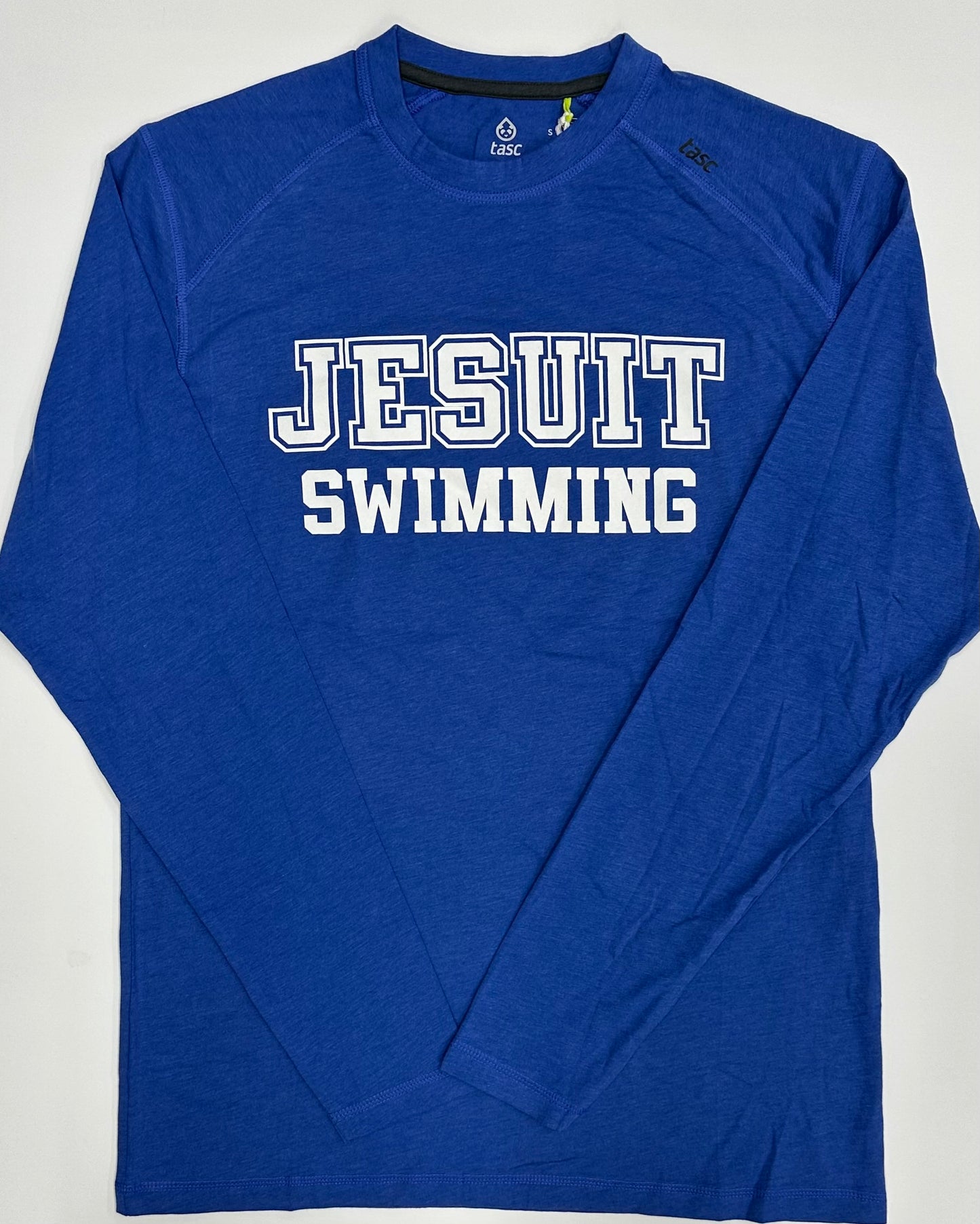 Tasc Performance.
Lightweight performance fabric for year-round comfort, modified raglan shoulder, 30" length.
52% Organic Cotton/43% Viscose from Bamboo/5% Lycra Spandex.
Jesuit SWIMMING logo.