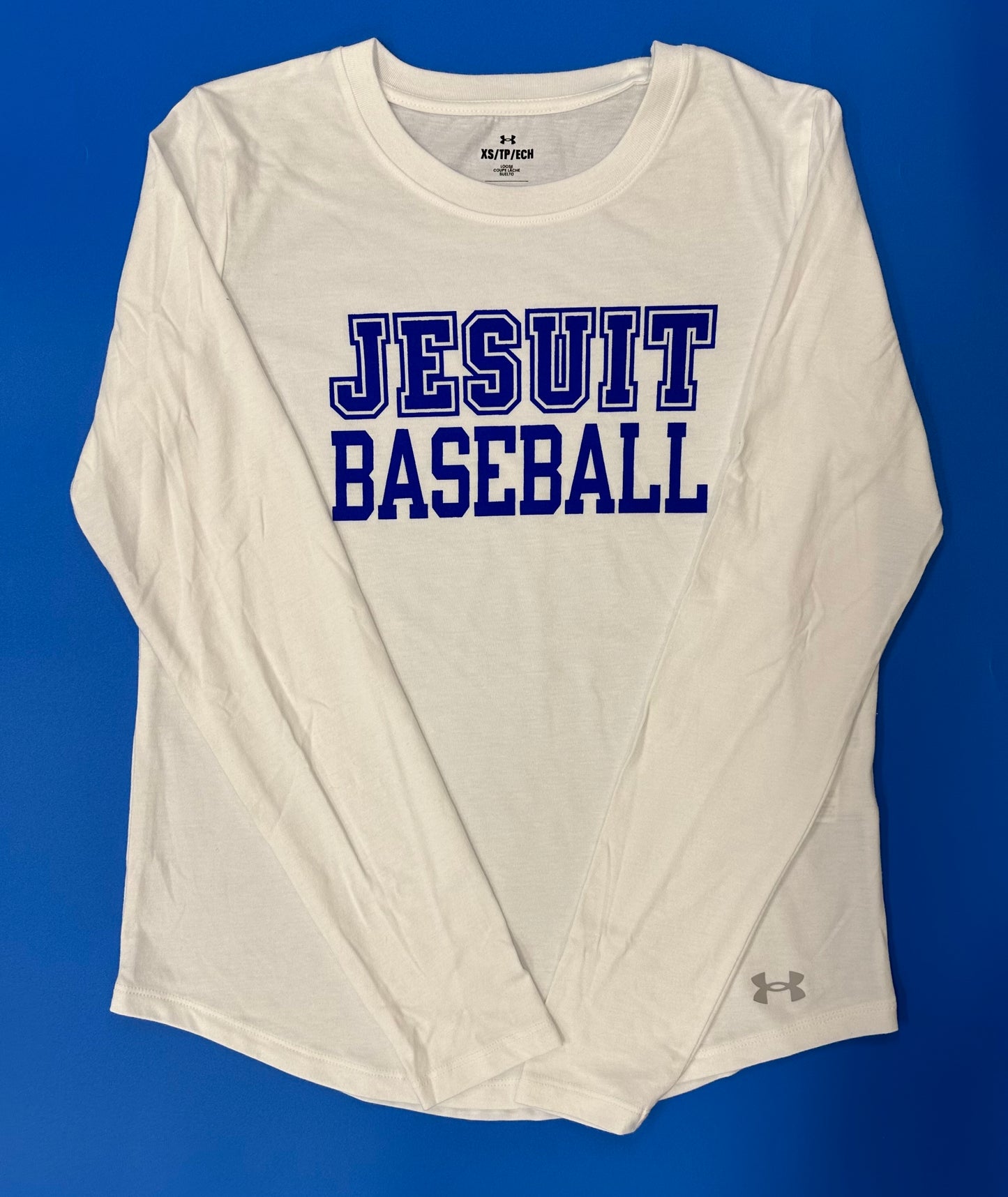 Under Armour.
60% Cotton/40% Polyester.
Performance cotton blend fabric. Set in sleeve construction. Open, rib knit collar. Curved bottom hem.
Jesuit BASEBALL logo.