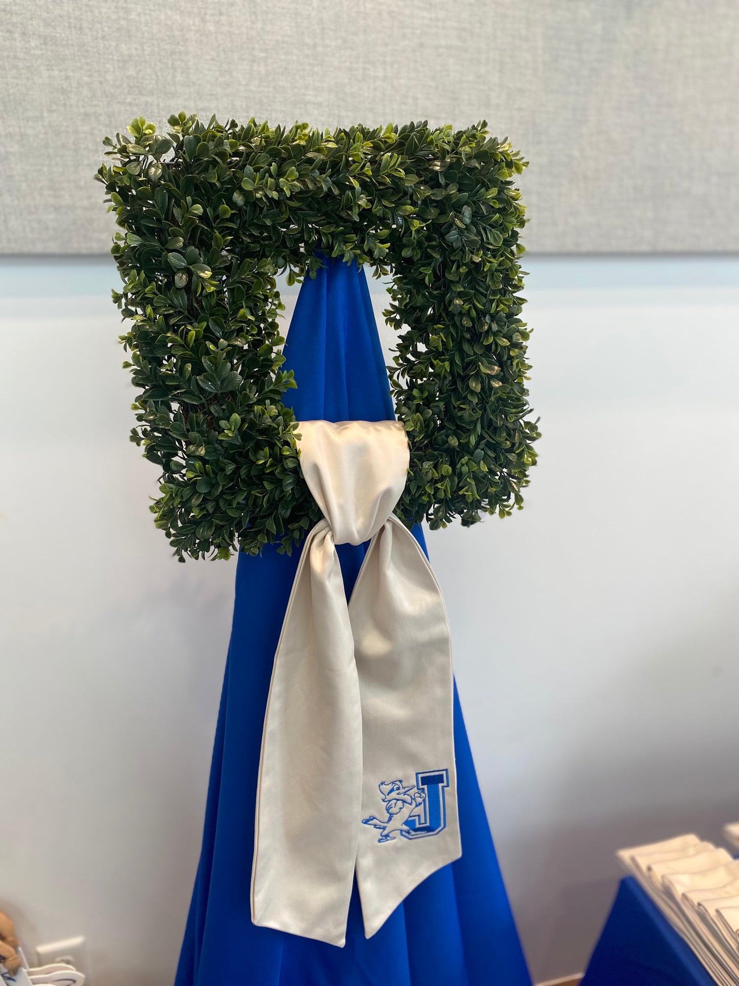 Fig & Dove. Decorate your front door or embellish your interiors with this elegant wreath sash (wreath not included)! Ivory fabric measures 5 inches in width by 54 inches long. J/Jayson embroidered logo.