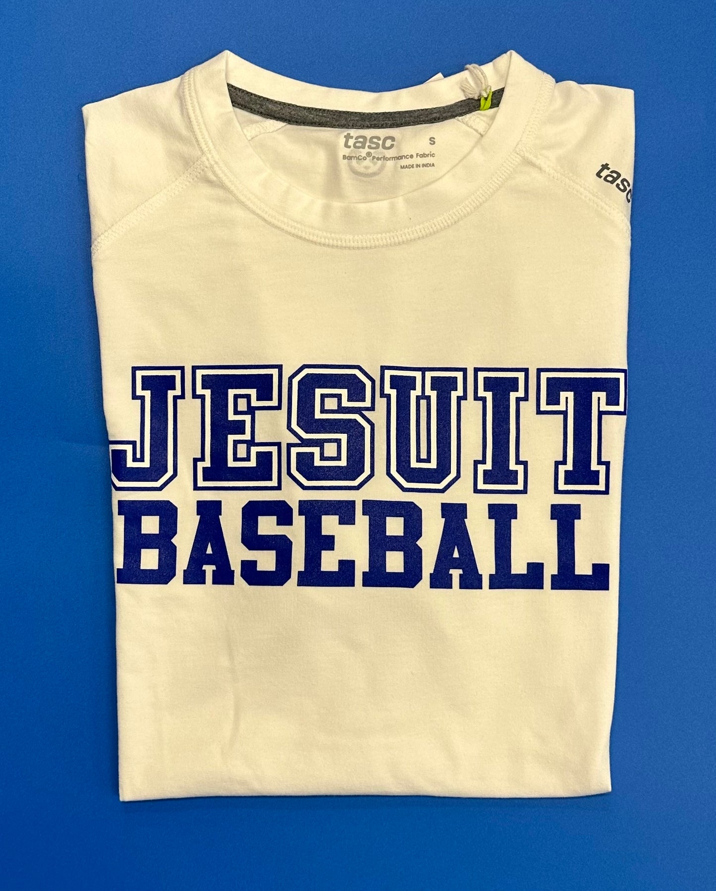 Tasc Performance.
The shirt that started this New Orleans brand!
Lightweight performance fabric for year-round comfort, modified raglan shoulder, 30" length.
52% Organic Cotton/43% Viscose from Bamboo/5% Lycra Spandex.
Jesuit BASEBALL logo.
