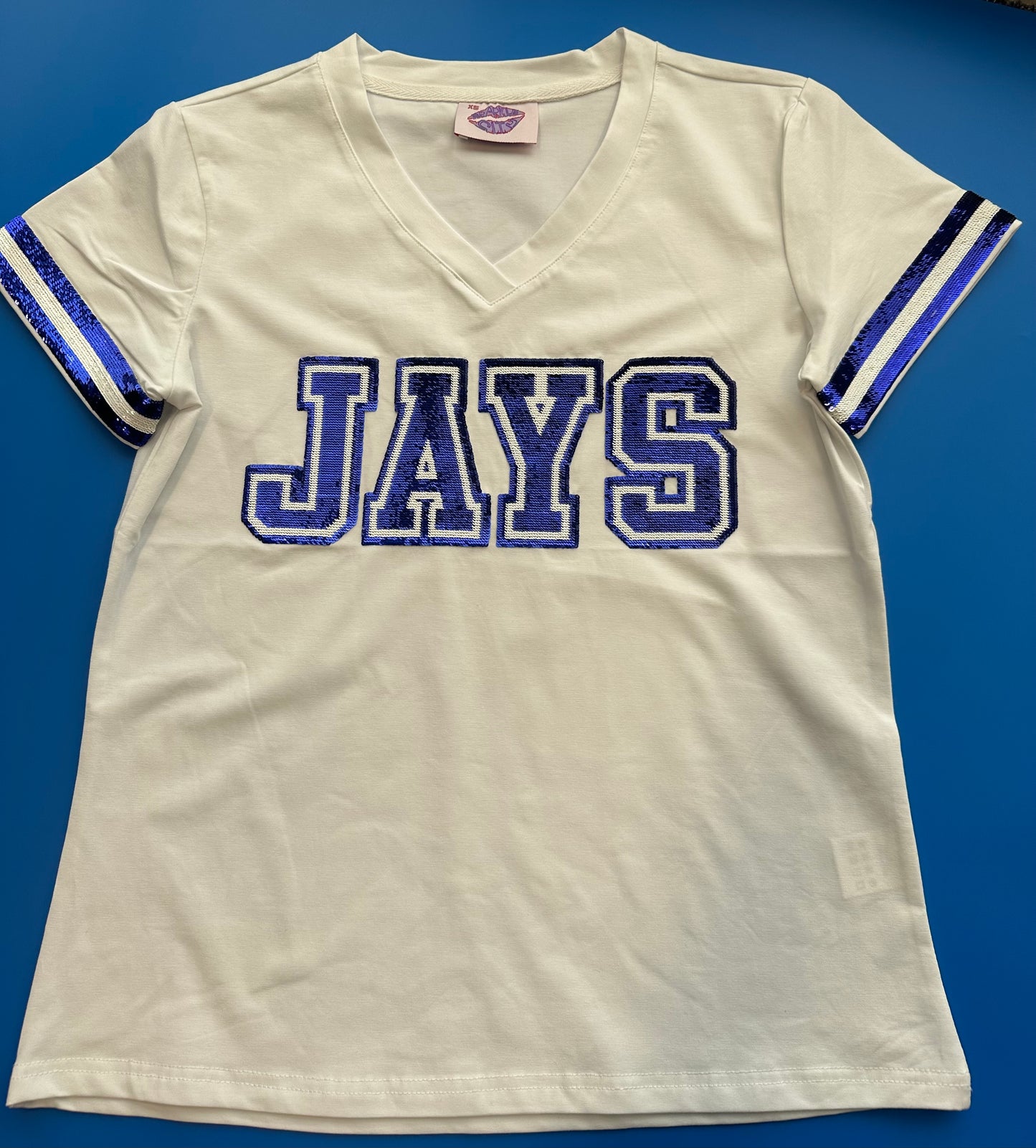 Sparkle City. 95% Cotton/5% Lycra. White tee with Royal Blue & White JAYS sequin trim as well as sequin trim on sleeves.