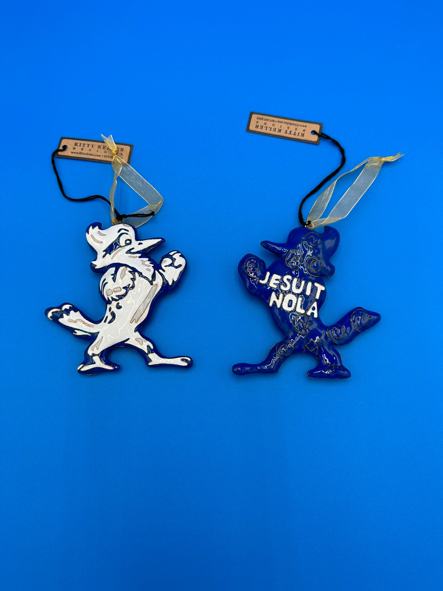 Kitty Keller Designs. Handmade - Cloisonne' ornament. Comes in a keepsake gift box. Our beloved Blue Jay mascot, Jayson! Includes insert with his story!