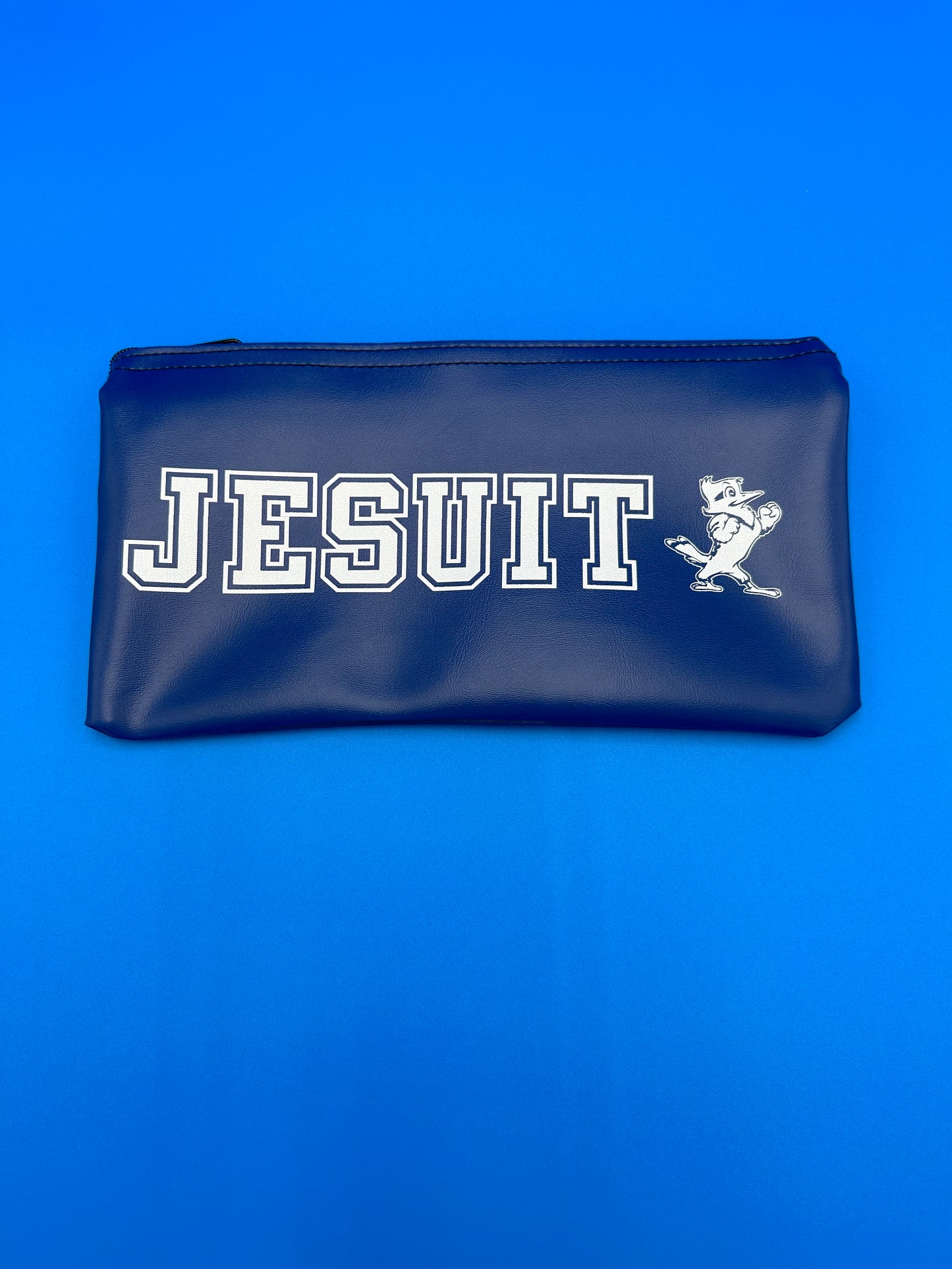 Royal blue Jesuit with Jayson logo. Vinyl zippered case. Measures 10.5" x 6".
