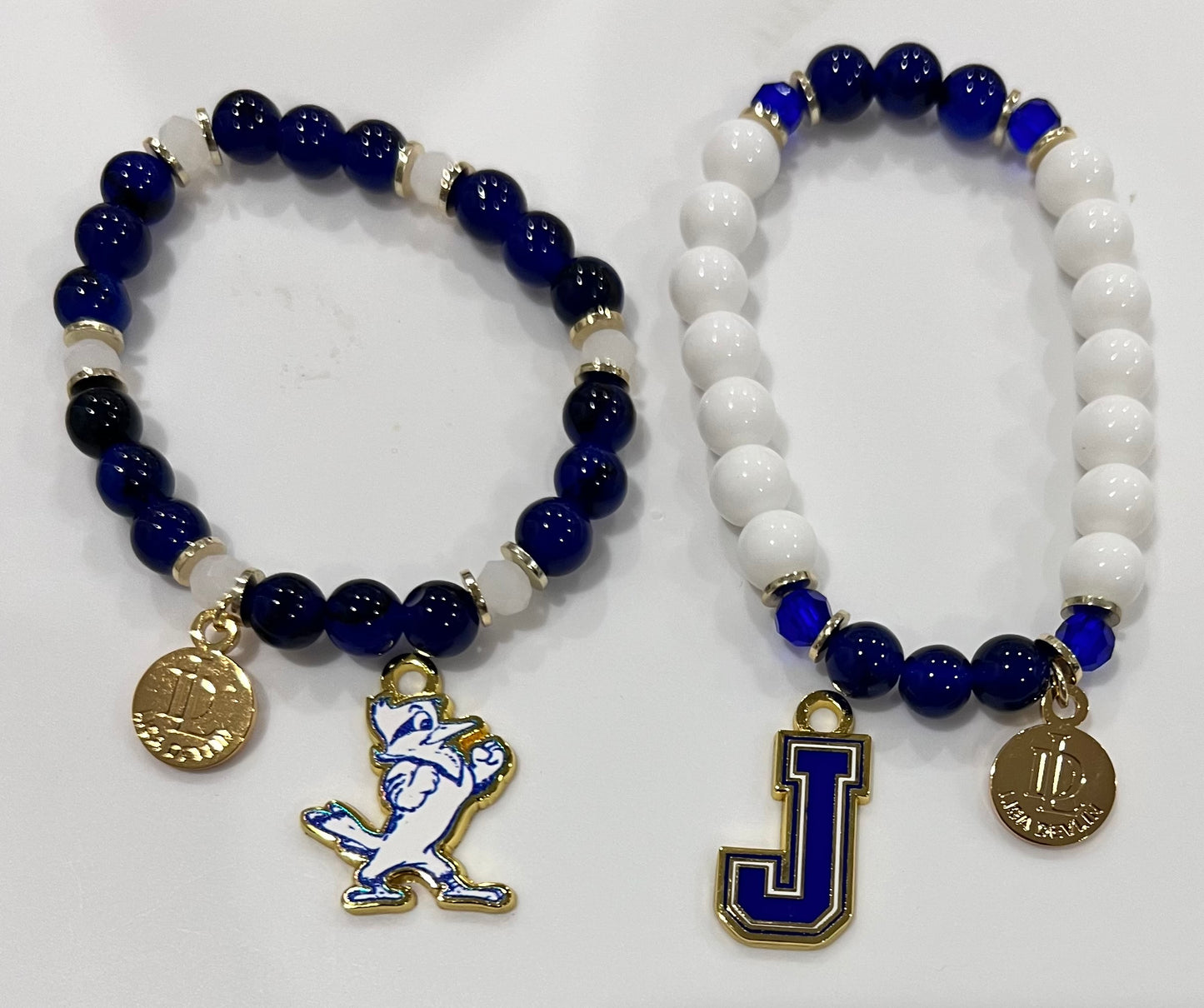 Lisa Devlin. 6mm agate beads spaced with 4 mm glass bead w/Charm. Additional charms sold separately and can be added to bracelets.