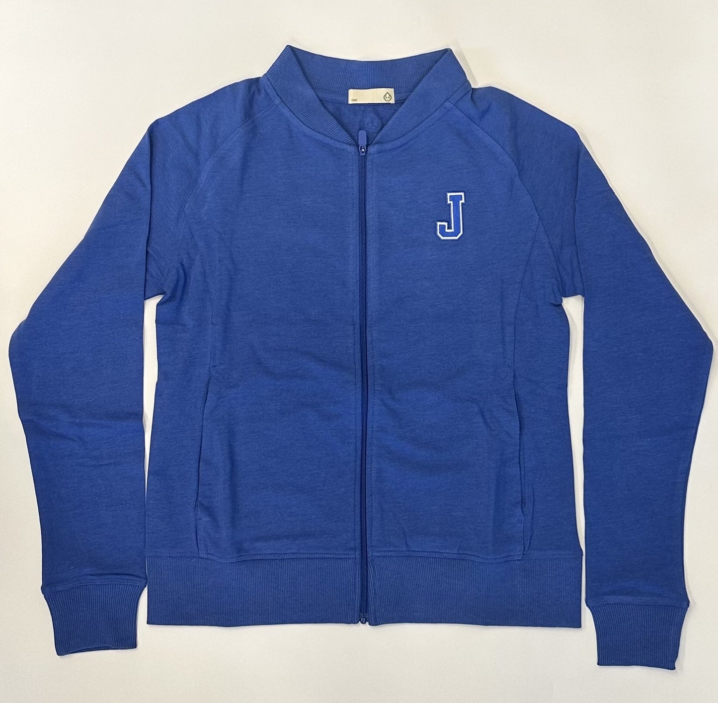 Tasc Performance. 53% Organic Cotton/43% Viscose from Bamboo/4% Lycra. Ribbed Baseball-style collar, side pockets, raglan sleeves, baby rib sleeve cuffs & bottom band, semi-fitted, 23" body length. Exclusive fabric, color and extended sizes. Embroidered J logo.