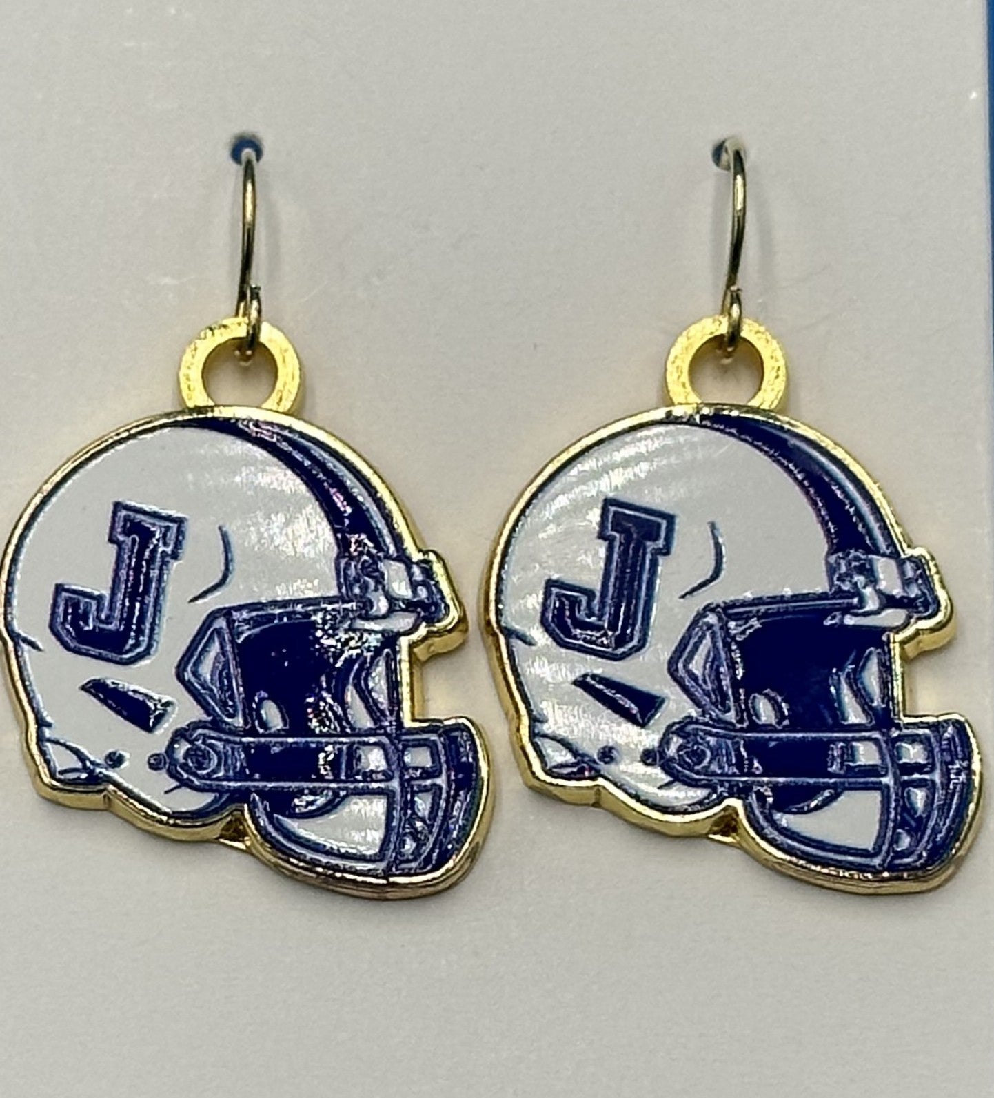 Lisa Devlin.
7/8" tall. 2 styles:
Football Helmet & Football