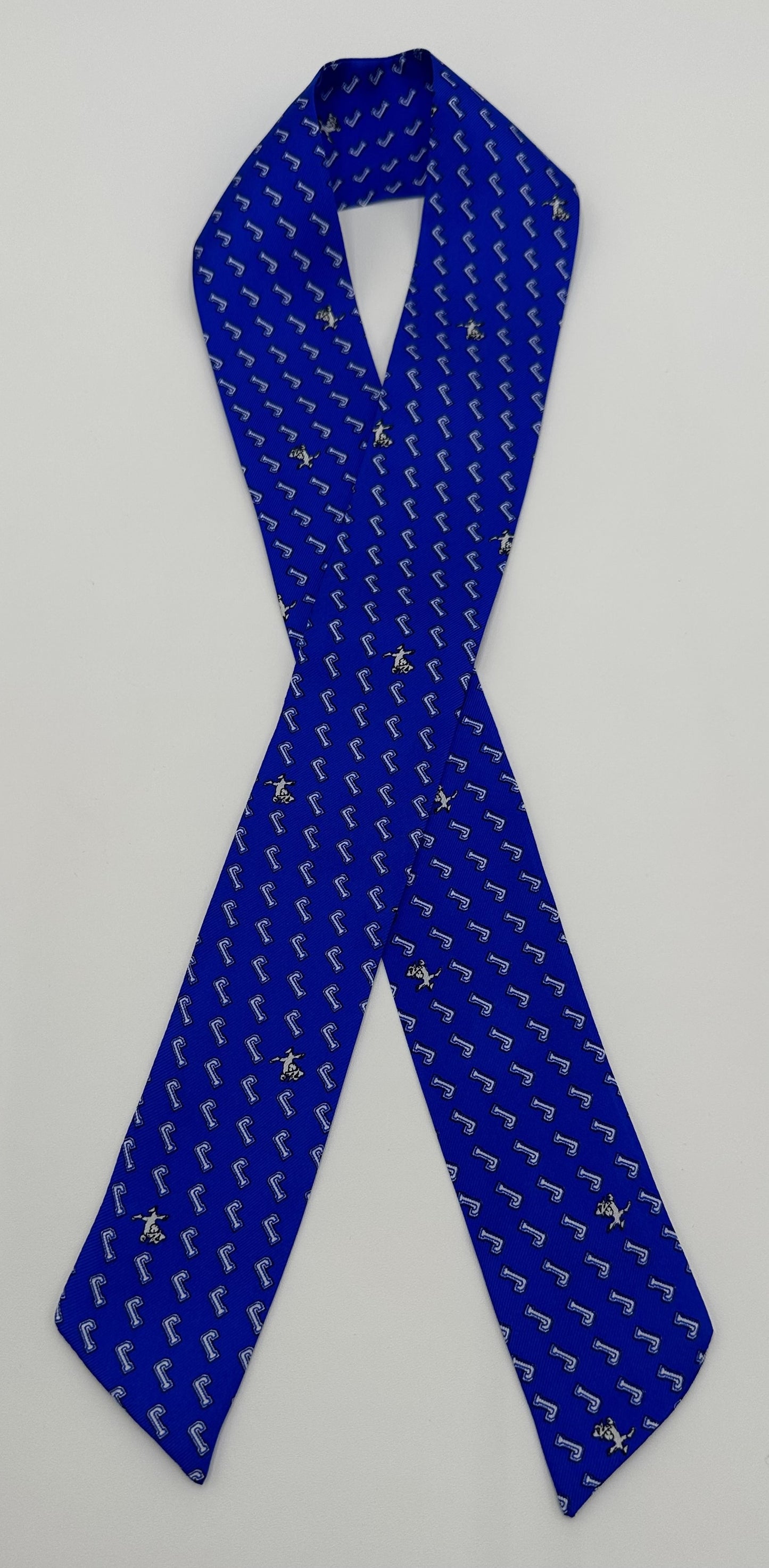 NOLA Couture. 100% Silk. Exclusive J/Jayson fabric. Double-sided narrow width fabric scarf known as a Twilly! Tie it on to your handbag strap or use in your hair or can even be used as a neck scarf! Dry Clean Only.
