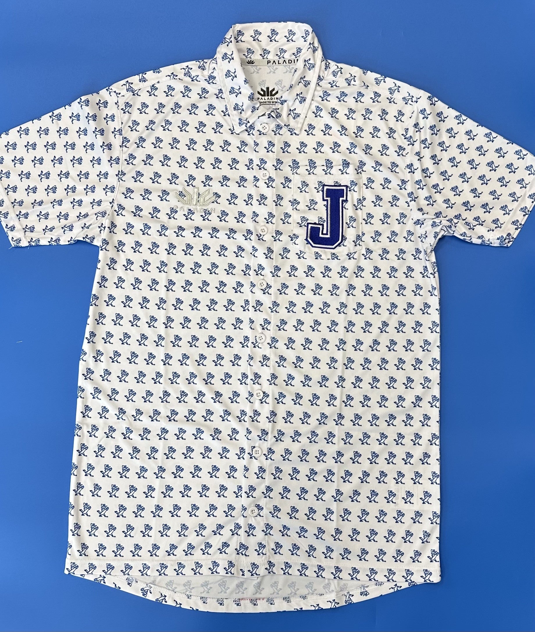 Paladin. 100% Polyester. Machine wash in cold water. Sublimated design with Jayson and embroidered J on Pocket. Vaporlite. Fold over cuffs and hem with scooped back. Standard Fit.