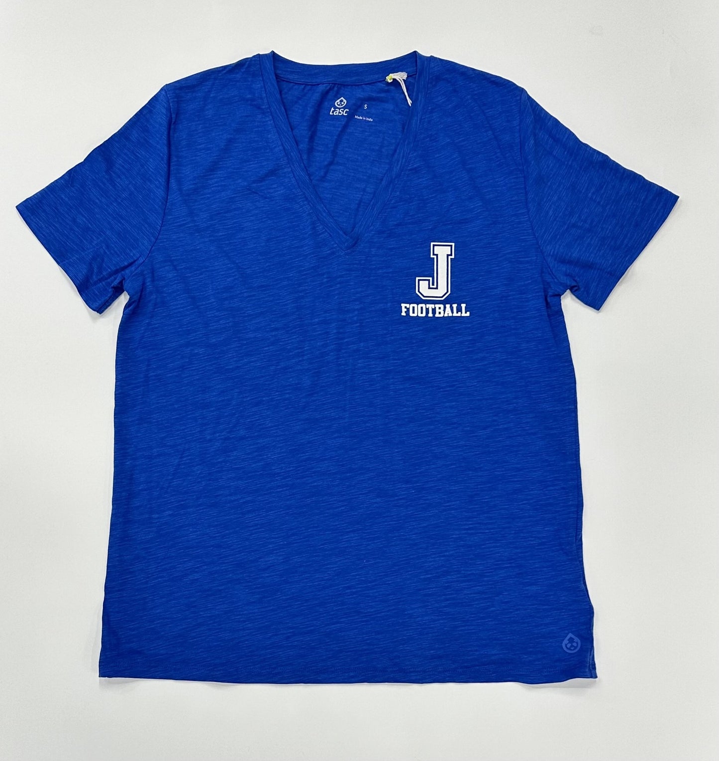 Tasc Performance. 52% Cotton/43% Viscose from Bamboo/5% Lycra. V-Neckline with scalloped bottom hem. Approximately 24.5 inches body length. Machine washable/Tumble dry low. Made with lightweight, breathable, moisture-wicking bamboo fabrication. J Football screenprint logo.