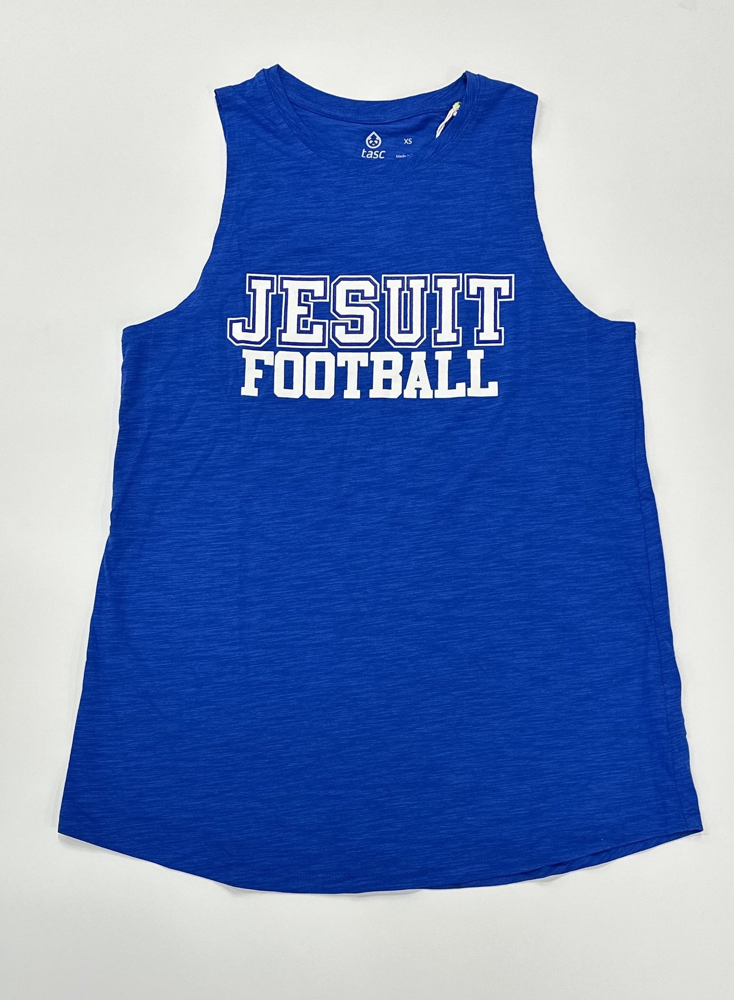 Tasc Performance. 53% Organic Cotton/43% Viscose from Bamboo, 4% Lycra Spandex. Relaxed, A-line Fit. High crew neckline. Slightly curved bottom hem. True side seam. Approx. 26.5” body length. Machine Washable/Dryer Safe. JESUIT FOOTBALL logo.