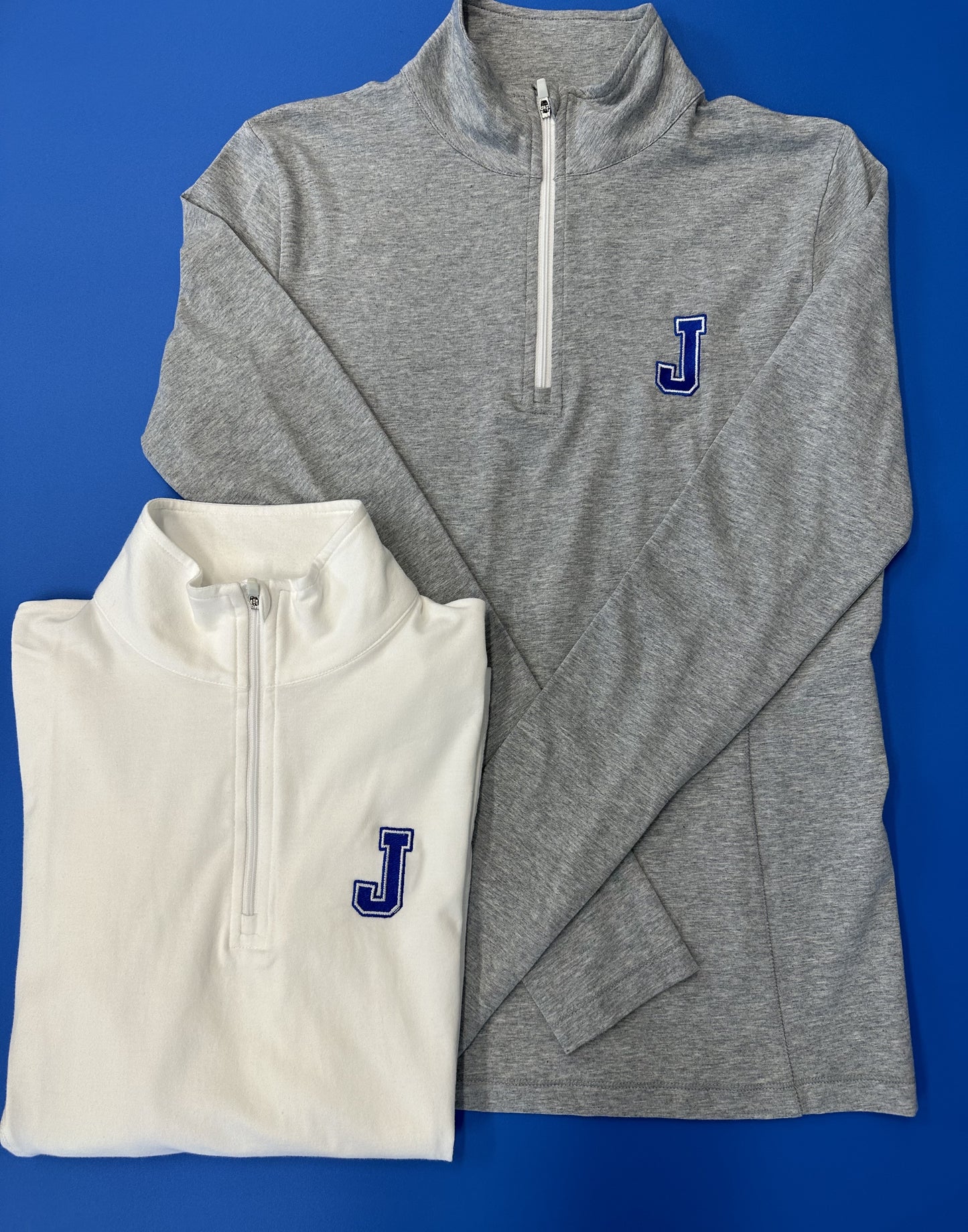 Tasc Performance. 51% Organic Cotton/41% Viscose from Bamboo/8% Lycra Lock down zipper w/inner storm flap, princess seaming, thumbholes, 24" body length. Embroidered J logo.