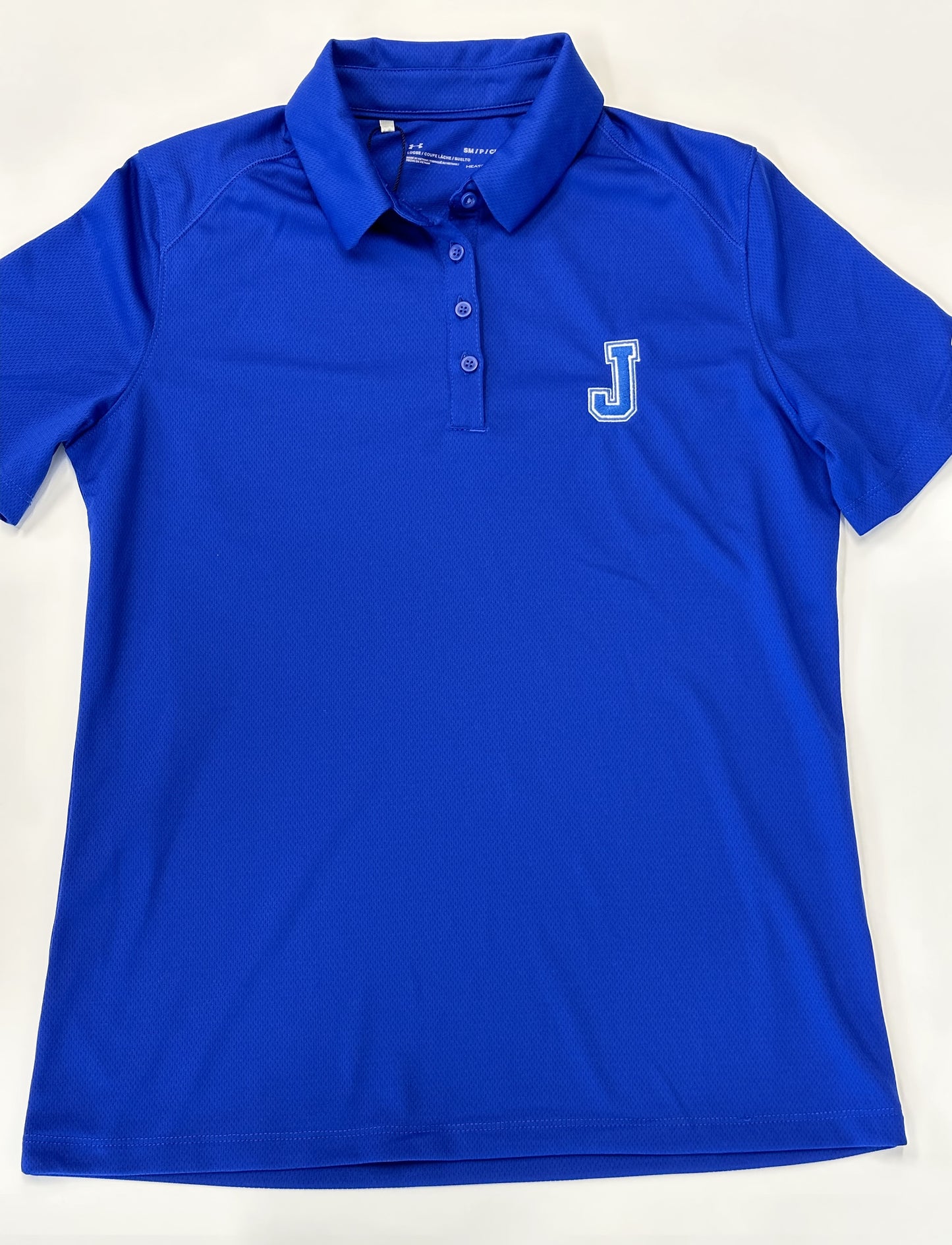Under Armour. 100% Polyester. Soft ant-pick, anti-pill fabric has cleaner, snag-free finish. 4-way stretch construction moves better in every direction. Material wicks sweat & dries really fast. Self-stand collar. Embroidered J logo.