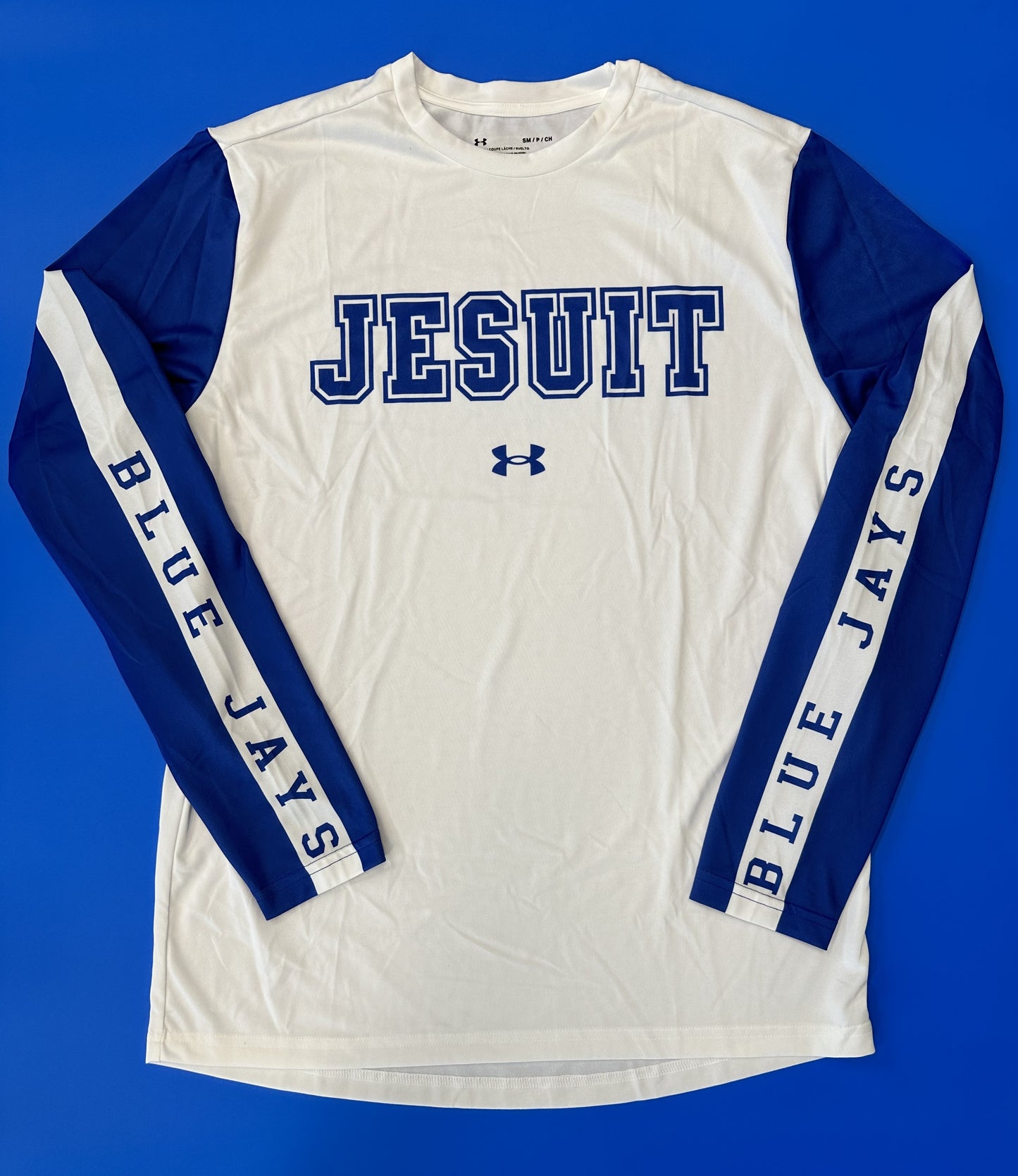 Under Armour Performance Fabric. 100% Polyester.