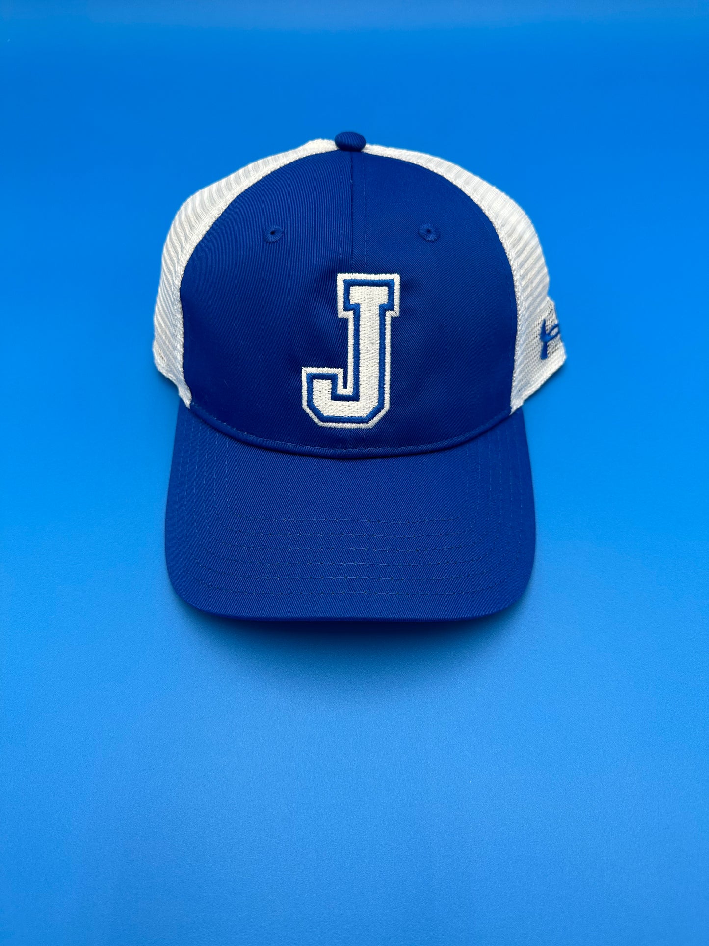 Under Armour. 65% Polyester 35% Cotton/100% Polyester Mesh. Relaxed unstructured adjustable. Snapback closure. One Size Fits Most.