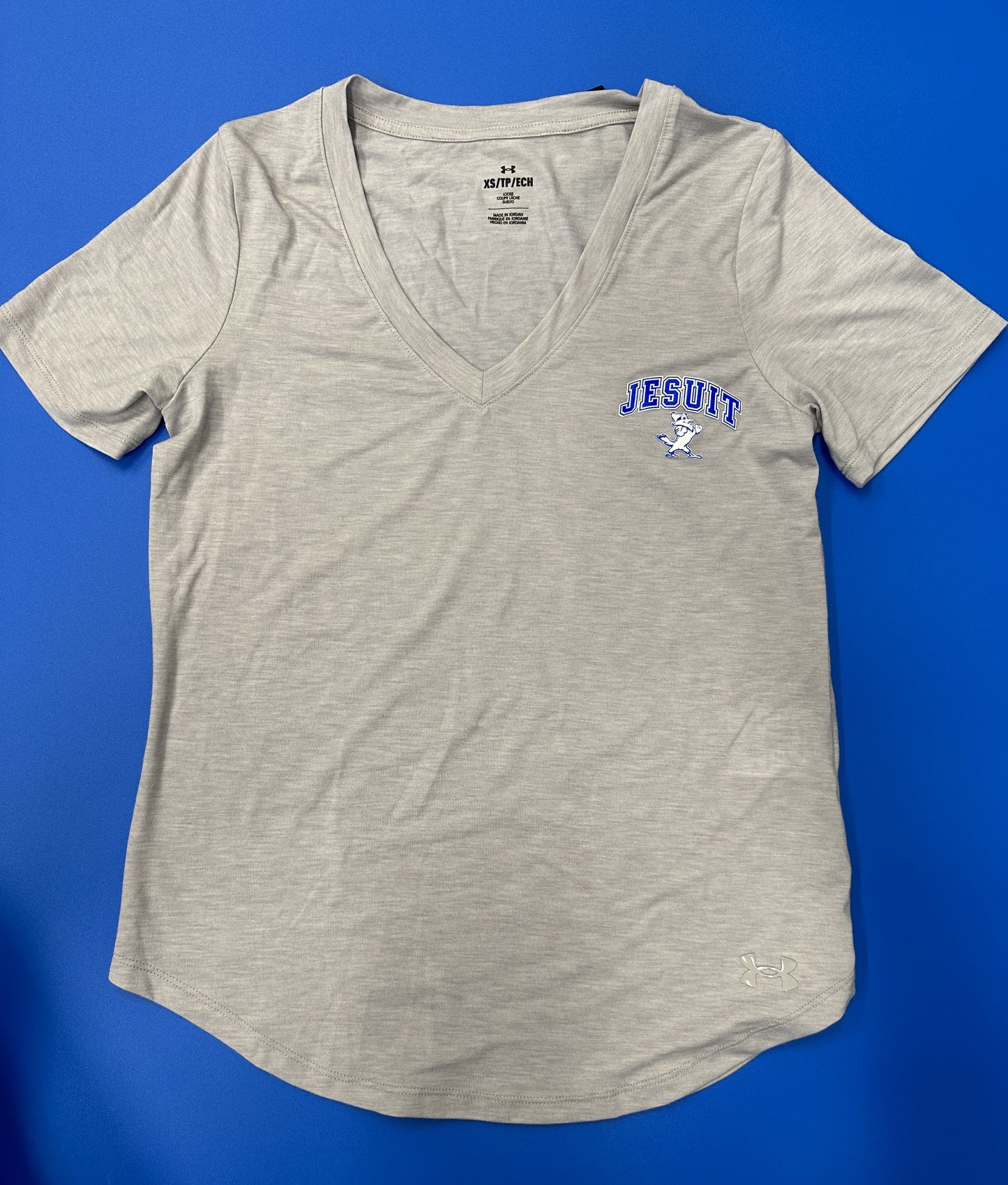 Under Armour. 74% Polyester/21% Lyocell/5% Elastane. Super-soft, blended fabric provides great hand & drape. Material wicks sweat & dries really fast. Curved bottom hem.