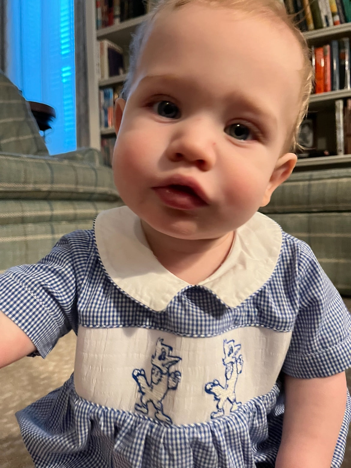 Hi! My name is Miller and my dad Mark graduated in 2014. I'm 9 months old and I'm wearing a size 12 month bubble.
