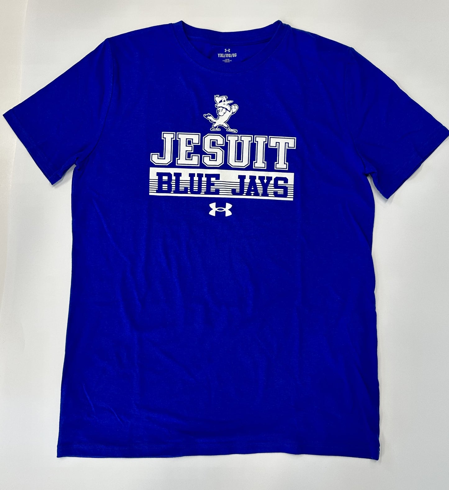 Under Armour. 60% Cotton/40% Polyester. Performance cotton blend fabric with set in sleeve construction.