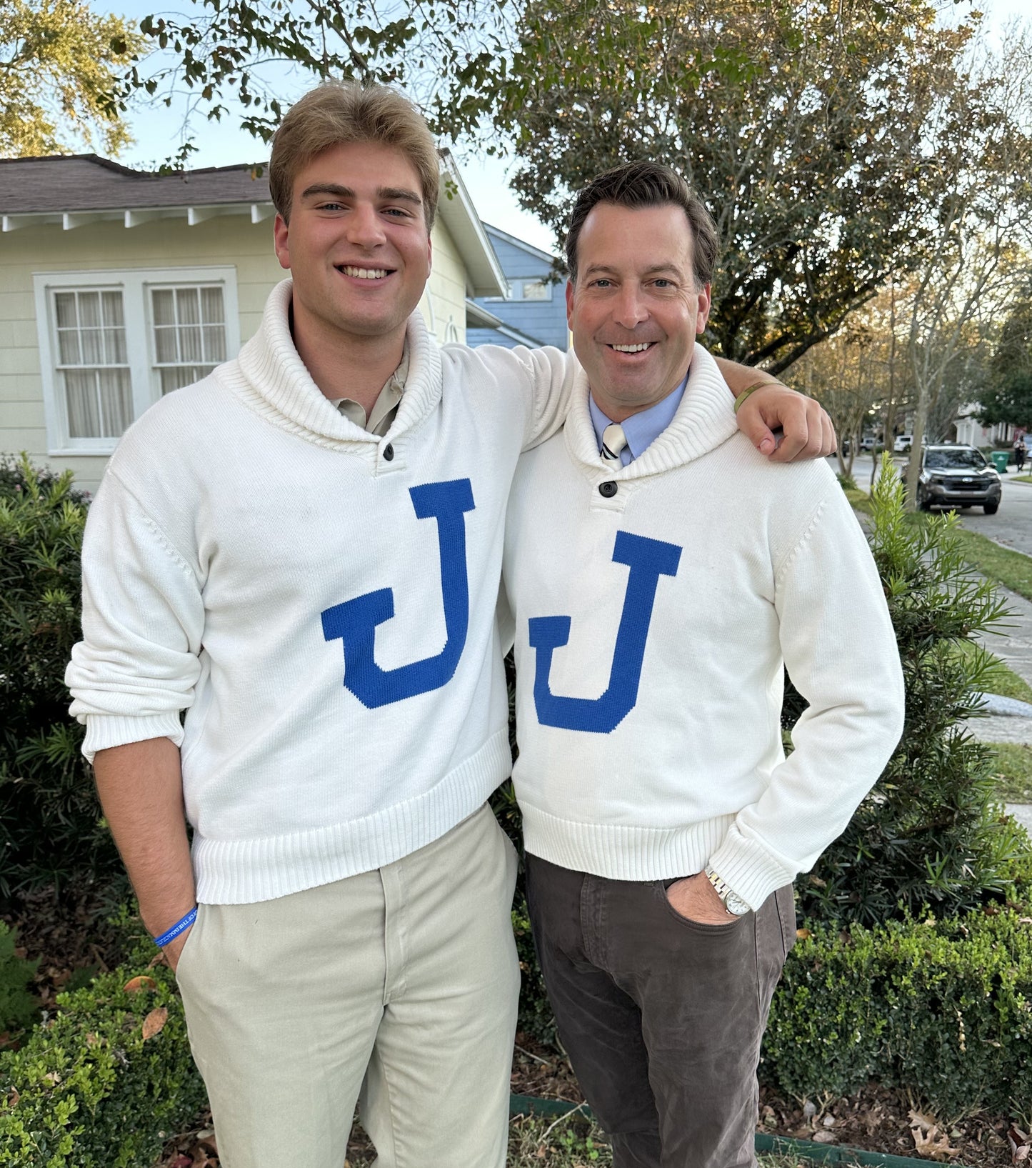Bruzer.

100% Cotton.

As we approach our 100 years on Carrollton and Banks, we celebrate its history with this vintage, inspired long sleeve, single button rolled collar sweater featuring intarsia J logo.

You might recognize the style as The Blue Jay Shop proudly displays a black and white picture of the 1923 Football team wearing the original!