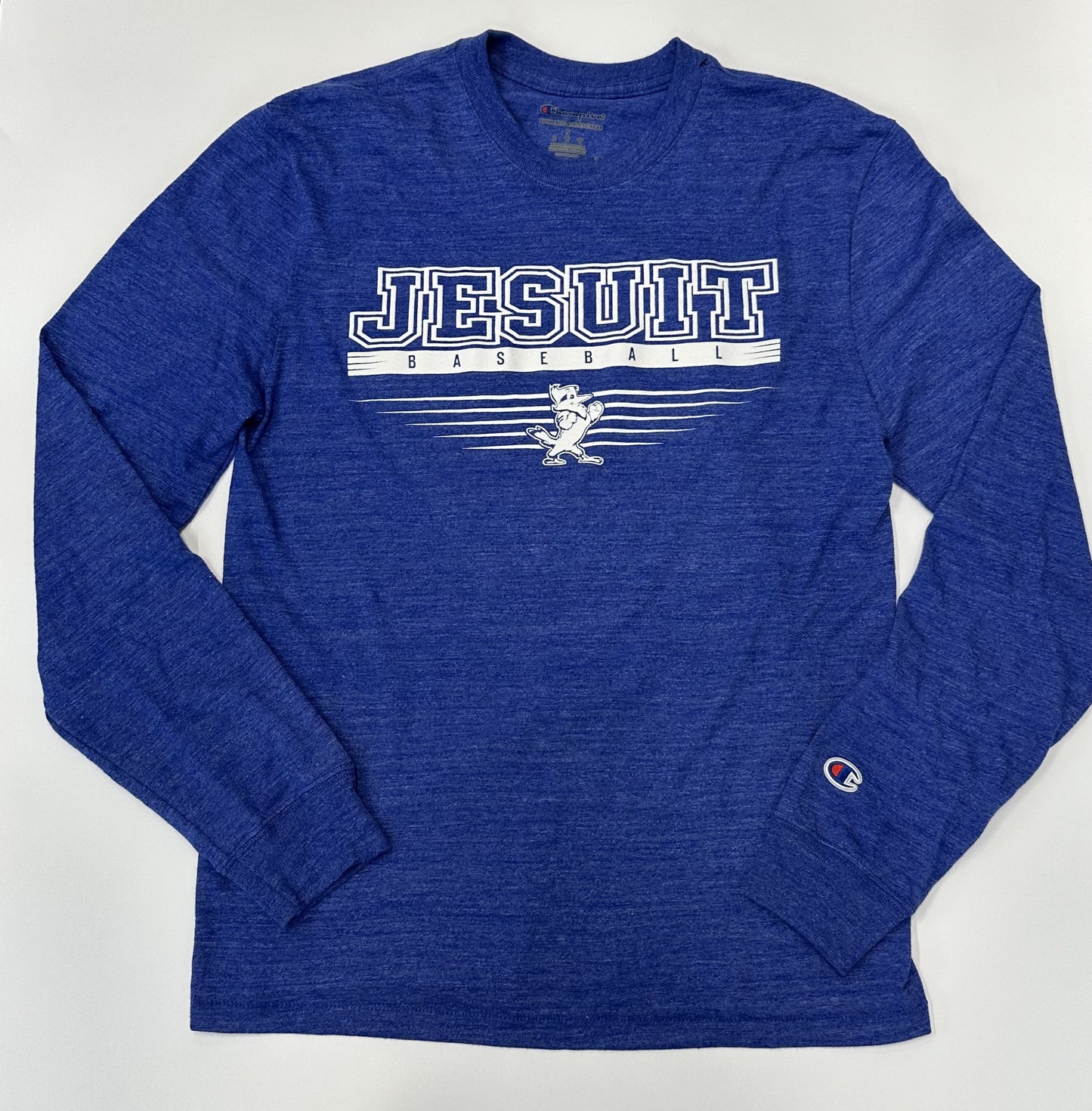 Champion.  50% Polyester/37% Cotton/13% Rayon Jersey. 1 x 1 rib at collar & cuffs. Set in long sleeve and straight body. Jesuit Baseball logo.
