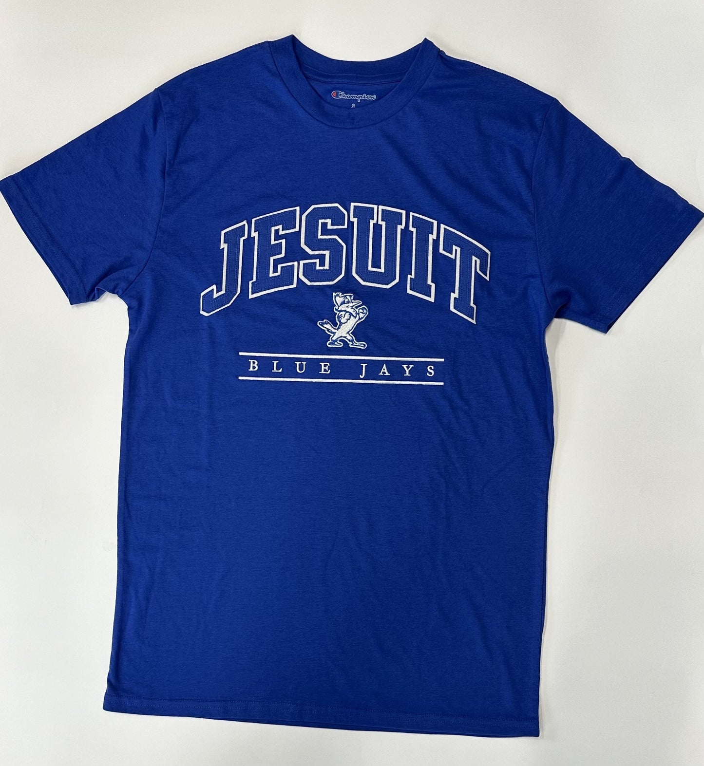 Champion. 60% Cotton/40% Polyester. From the 2024 Stadium Collection. Comfortable and super soft cotton/polyester jersey with 1 x 1 rib crew neckline. Jesuit logos - applique application with Jayson and Blue Jays.