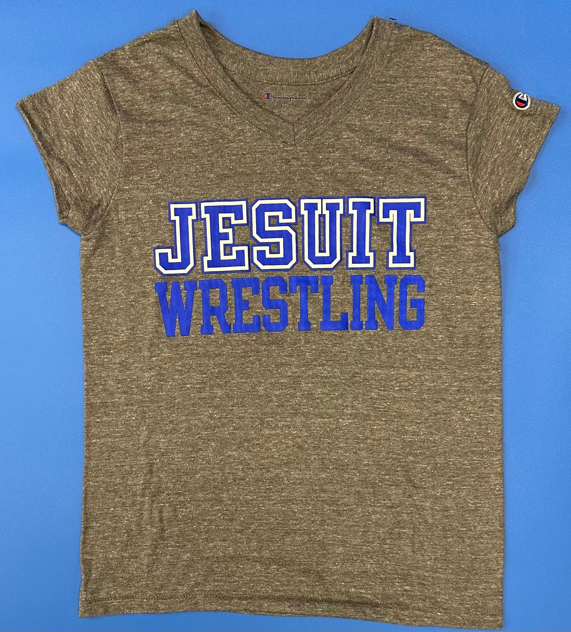 Champion.

Tri-Blend: 50% Polyester/37% Cotton/13% Rayon Jersey.

1 x 1 rib at collar.

Set in short sleeve & relaxed body.

JESUIT WRESTLING logo.