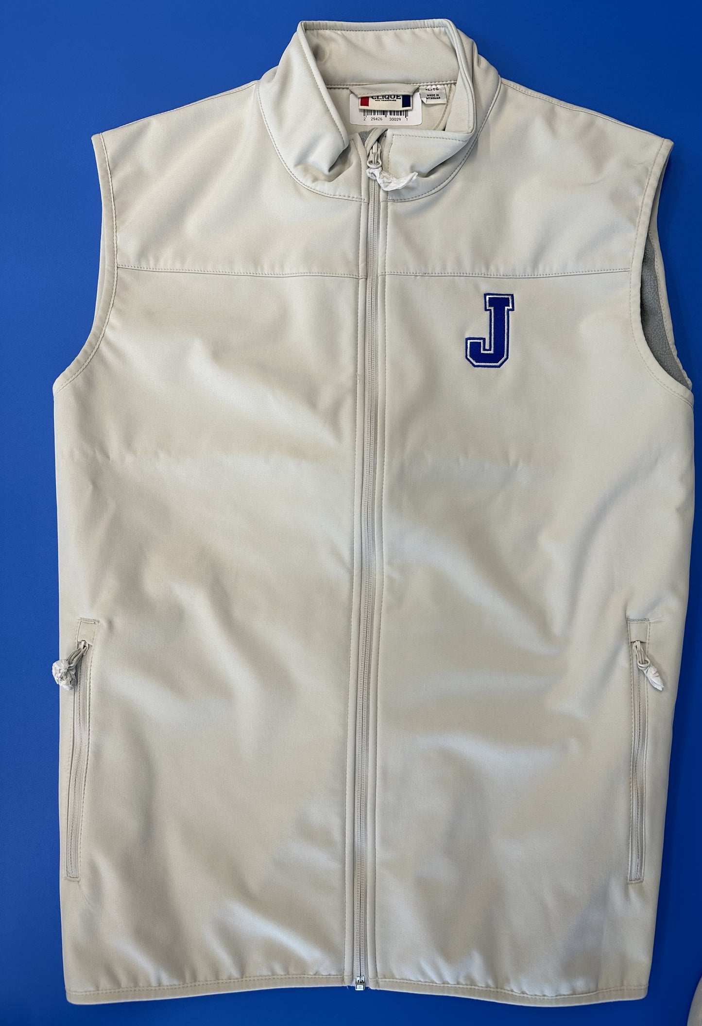 Clique  Outer:  96% Polyester/4% Spandex  Fleece Lining:  100% Polyester.  Embroidered J logo.