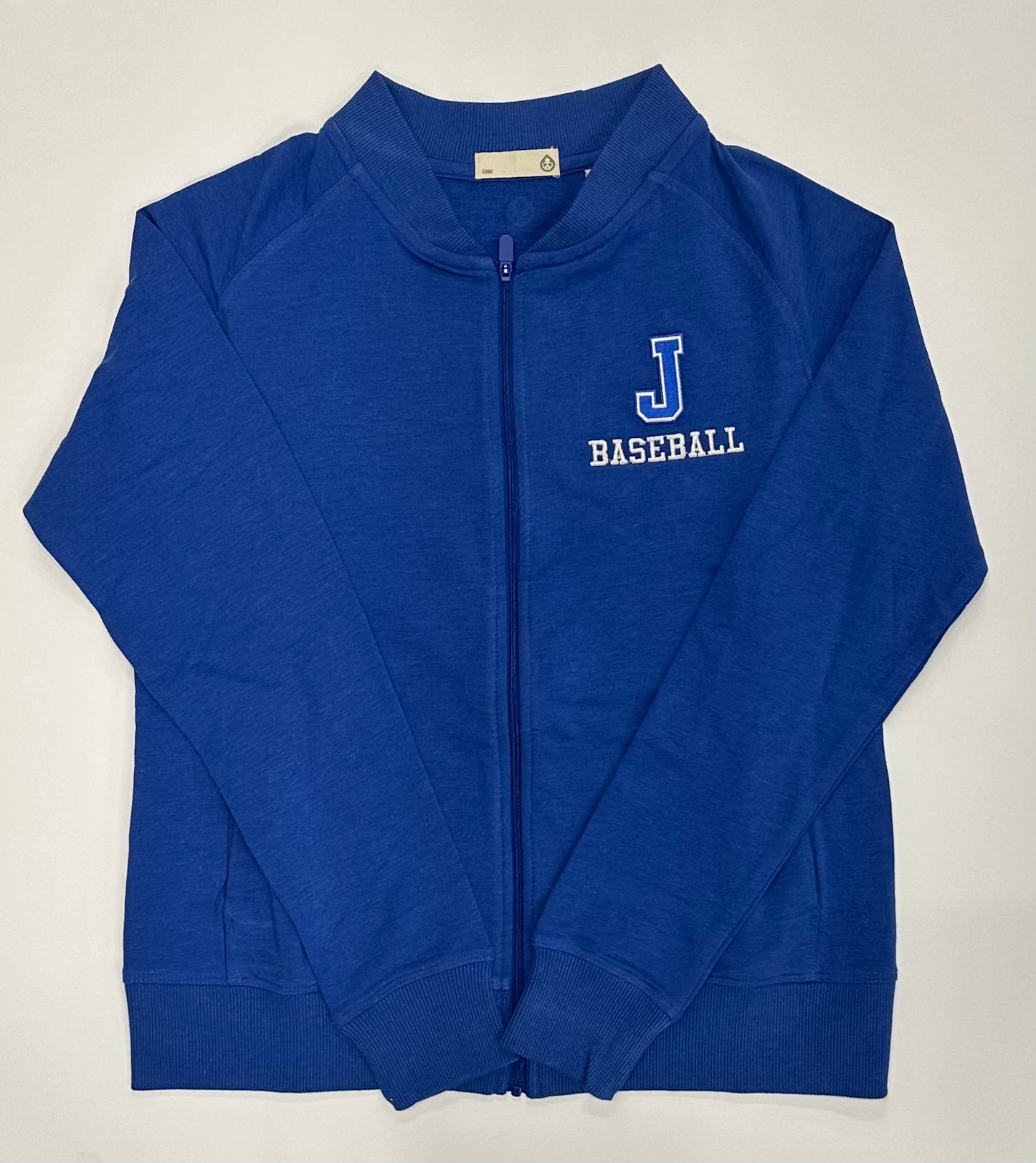 Tasc Performance.

53% Organic Cotton/43% Viscose from Bamboo/4% Lycra.

Ribbed Baseball-style collar, side pockets, raglan sleeves, baby rib sleeve cuffs & bottom band, semi-fitted, 23" body length.

Embroidered J BASEBALL logo.