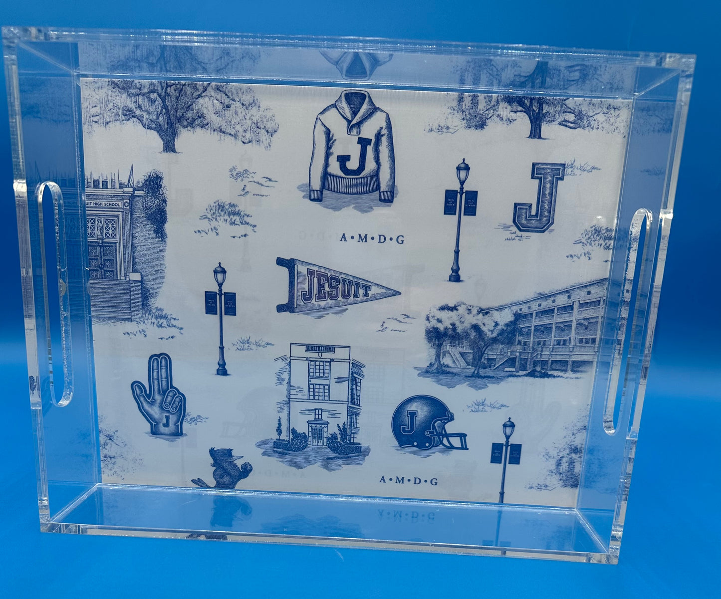 Marye-Kelley.

The possibilities are endless with this decorative tray. Perfect for an accent for all your Jesuit get togethers. Also great for the backyard as a serving or charcuterie tray.

The inserts slide in and out of a compartment at the bottom of the tray, are printed on both sides and are waterproof, weatherproof and tearproof.

2 SIZES: 8 1/2 x 11 inches and
11 x 17 inches

CUSTOM JESUIT TOILE PRINT.