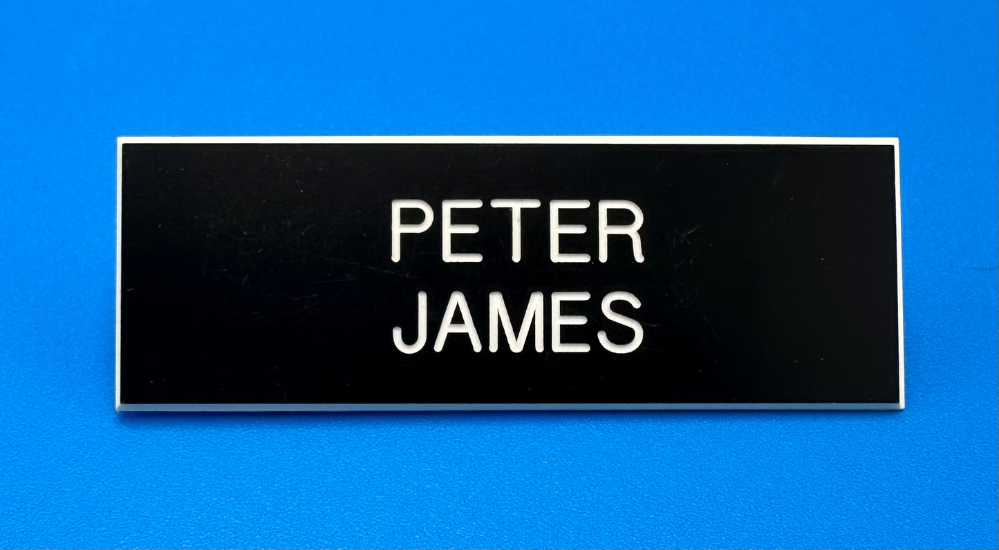 Official uniform nametag.

2 Prong backs.

Orders placed through WEDNESDAY, AUGUST 5th can be picked up on REGISTRATION DAY, TUESDAY, AUGUST 11th. New Students will receive 2 complimentary nametags.

IF YOUR METHOD OF PAYMENT IS APPLE PAY, PLEASE REVIEW YOUR ORDER FIRST BEFORE CONFIRMING. APPLE PAY defaults to SHIP ORDER rather than PICK UP.