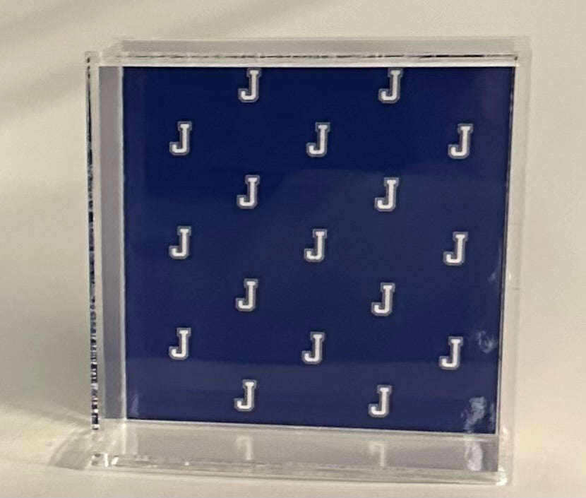 Marye-Kelley.

The possibilities are endless with this decorative tray. Perfect to use for keeping your student's must haves together and organized - Jesuit nametags, J pin, school I.D.!

The inserts slide in and out of a compartment at the bottom of the tray, are printed on both sides and are waterproof, weatherproof and tearproof.

Size: 6 x 6 square

All over J logo.