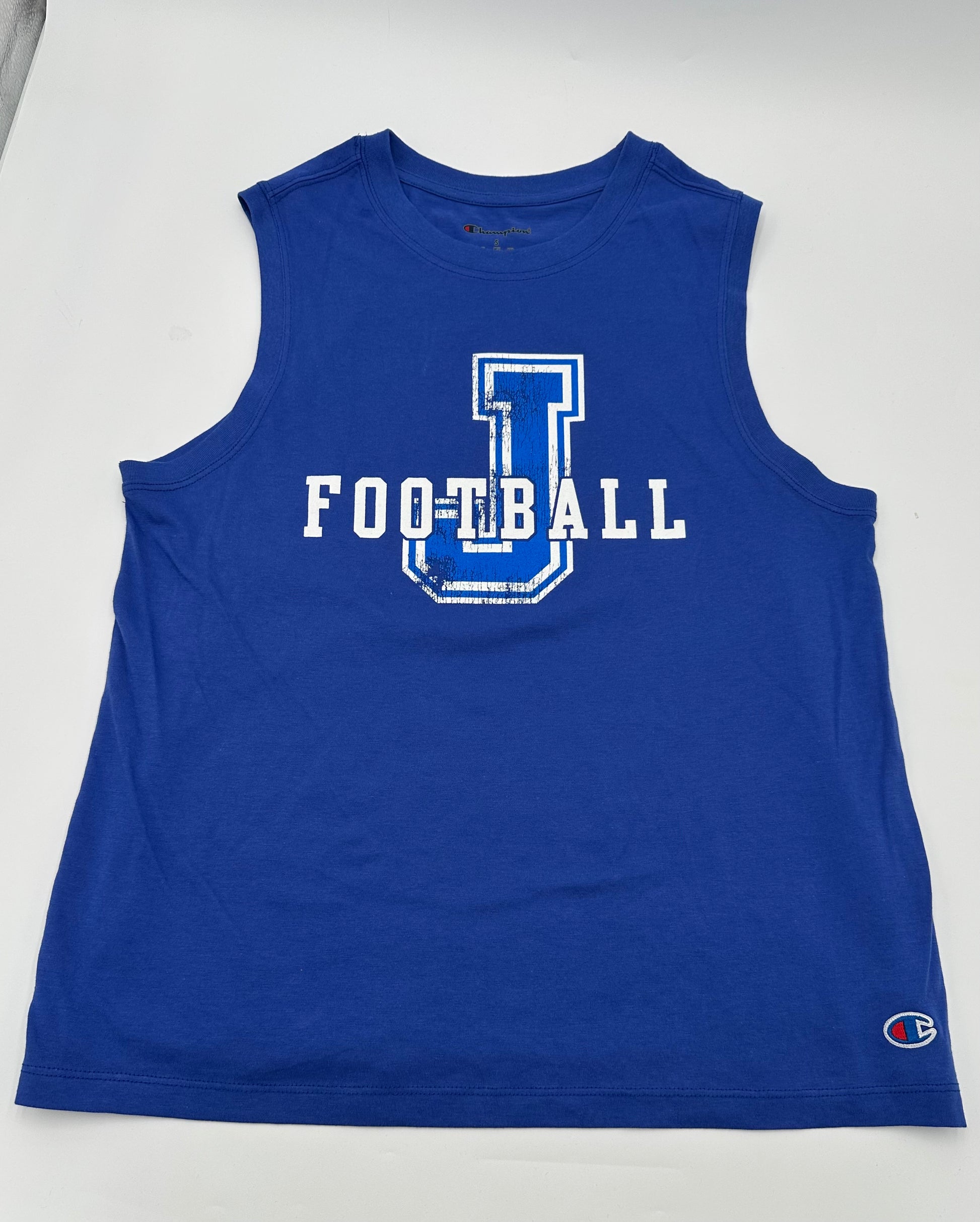Champion.

60% Cotton/40% Polyester jersey.

Relaxed fit, 25" body length. Rib collar.

J FOOTBALL distressed logo.