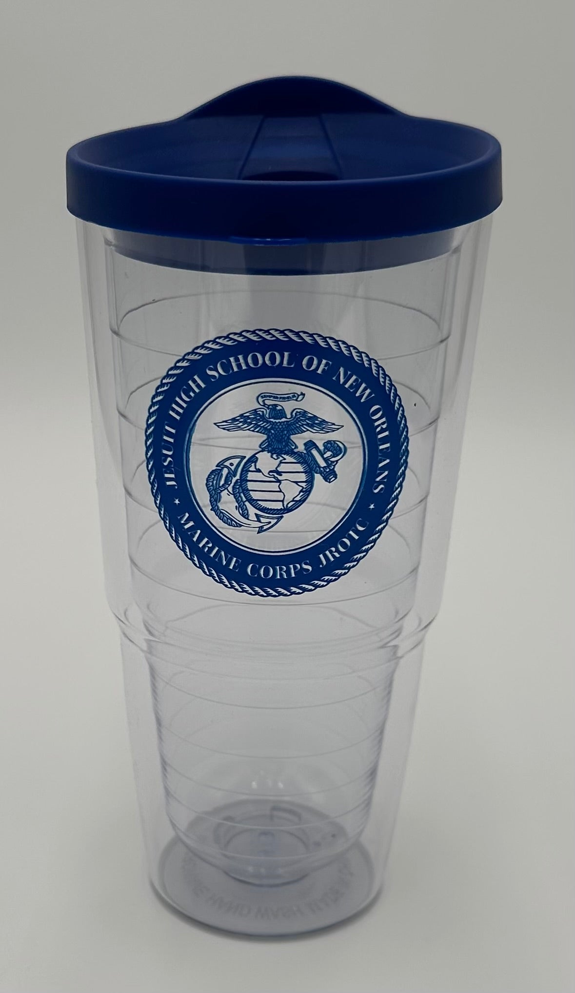 Clear Tumbler with Royal top.

Features the MCJROTC logo.