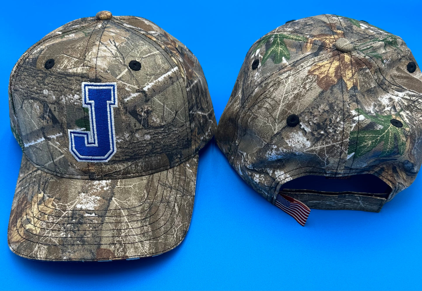 Outdoor Cap Company.  Back by popular demand. Calling all hunters!  Realtree Edge Camo pattern. Adjustable Velcro closure.  Embroidered J logo.