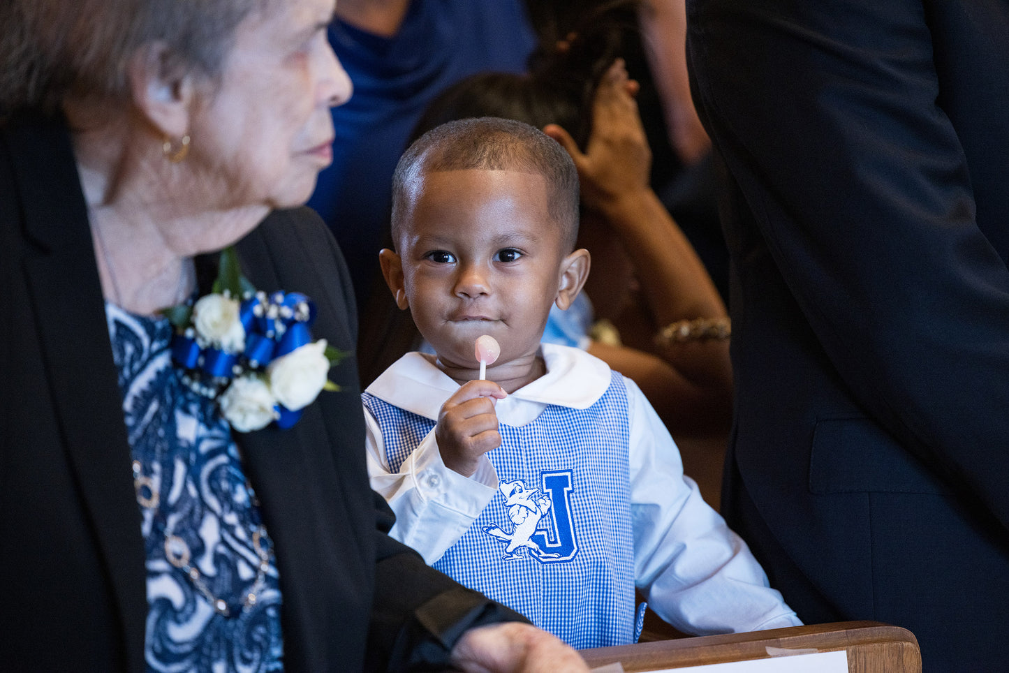 Vive La Fete.  55% Polyester/45% Cotton.  Machine Wash. Embroidered J/Jayson Logo.  This boy's classic Jon Jon all in one button-on suit will show off his Blue Jay Spirit!