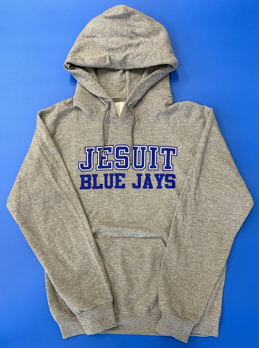 Jerzees.  51% Polyester/49% Cotton.  2 ply hood with grommets.  Front pouch pocket. 1 x 1 rib cuffs and waistband.  Screen printed Jesuit Blue Jays logo.