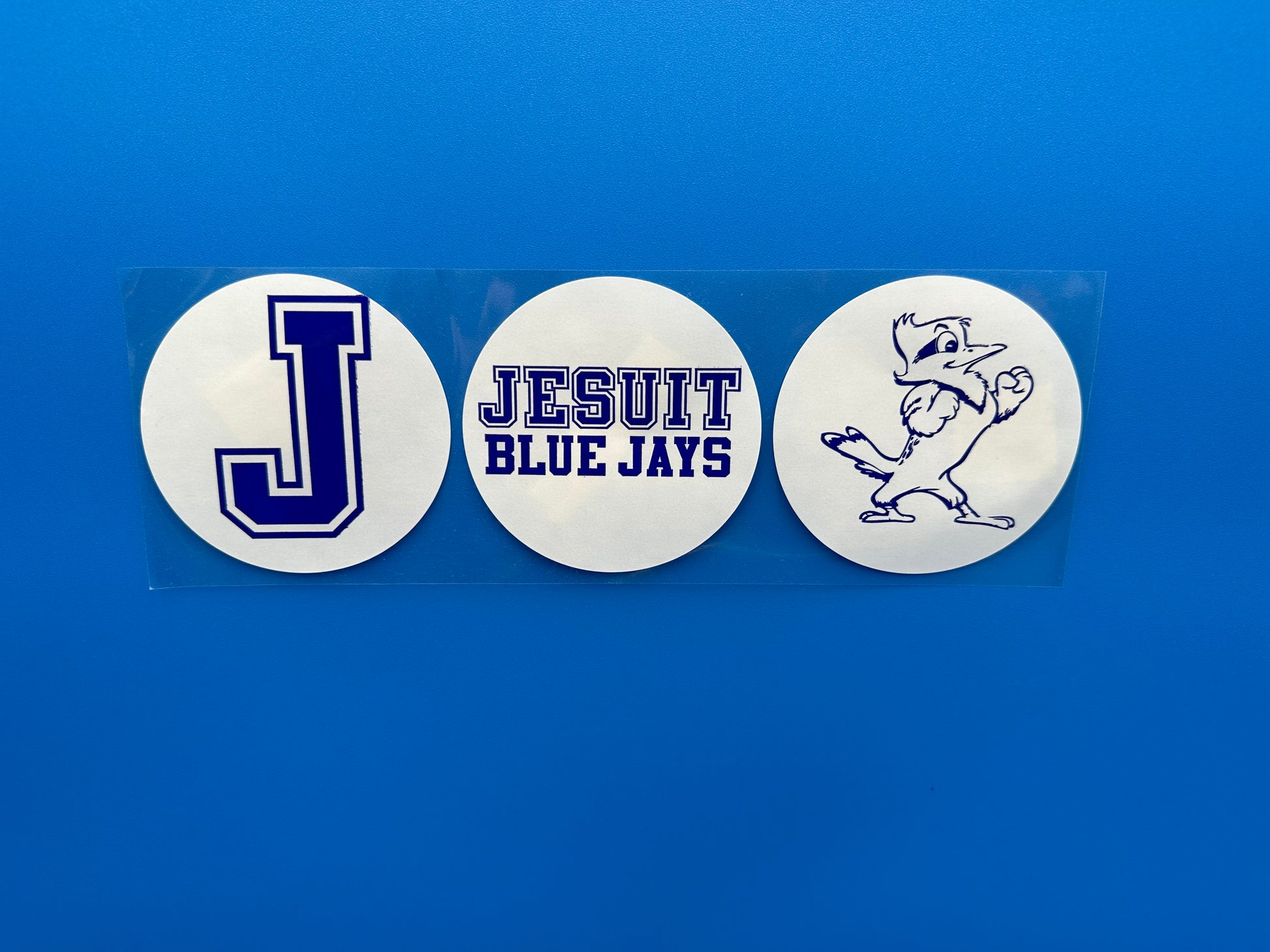 Show your Blue Jay Spirit!  Set of 3 stickers - J, Jayson & Jesuit Blue Jays.   Each round sticker measures 3 inches.