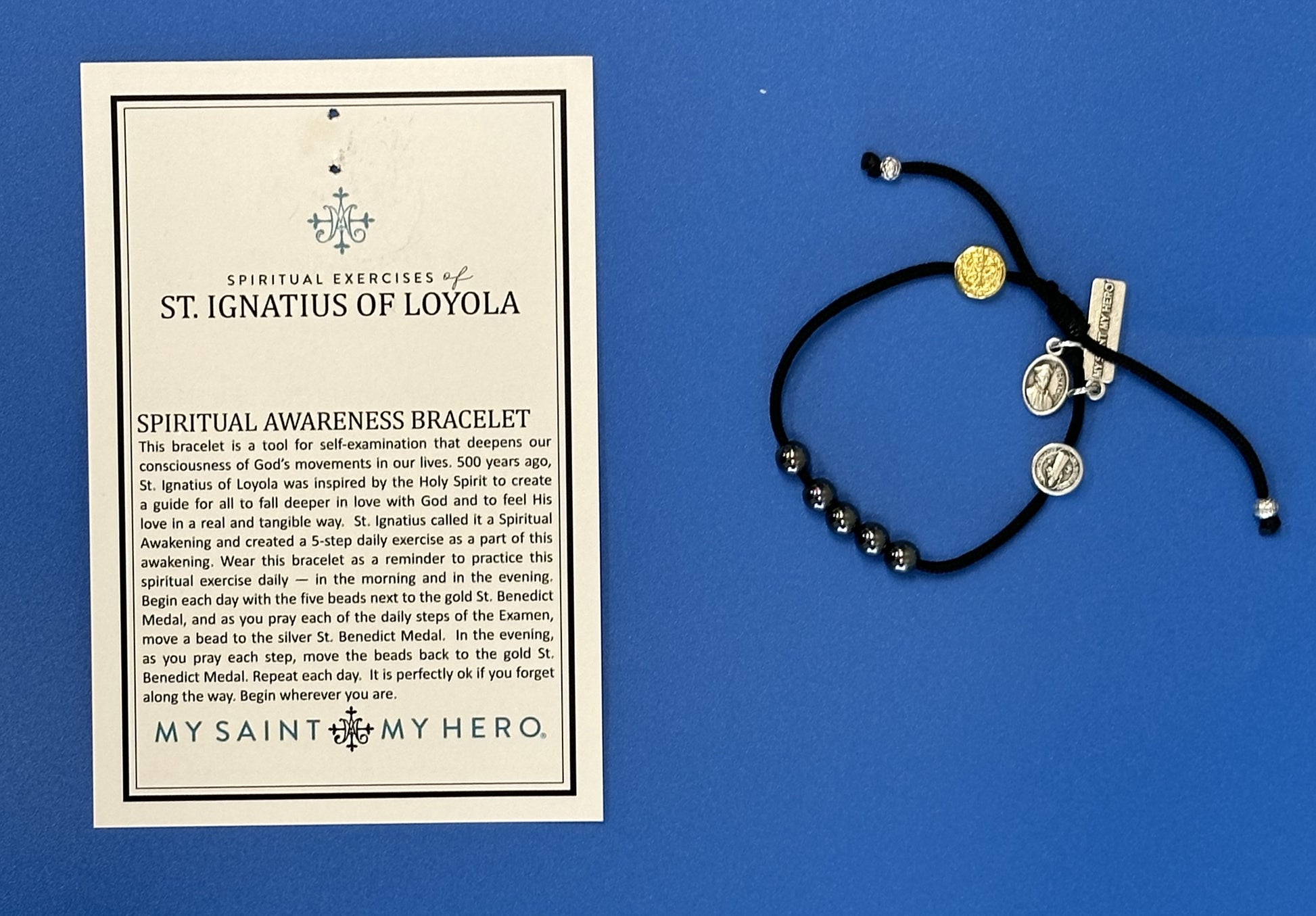 My Saint My Hero.  This bracelet is a tool for self-examination that deepens our consciousness of God's movements in our lives. St. Ignatius called it a Spiritual Awakening and created a 5-step daily exercise as a part of this awakening. Wear this bracelet as a reminder to practice this spiritual exercise daily - in the morning and in the evening.