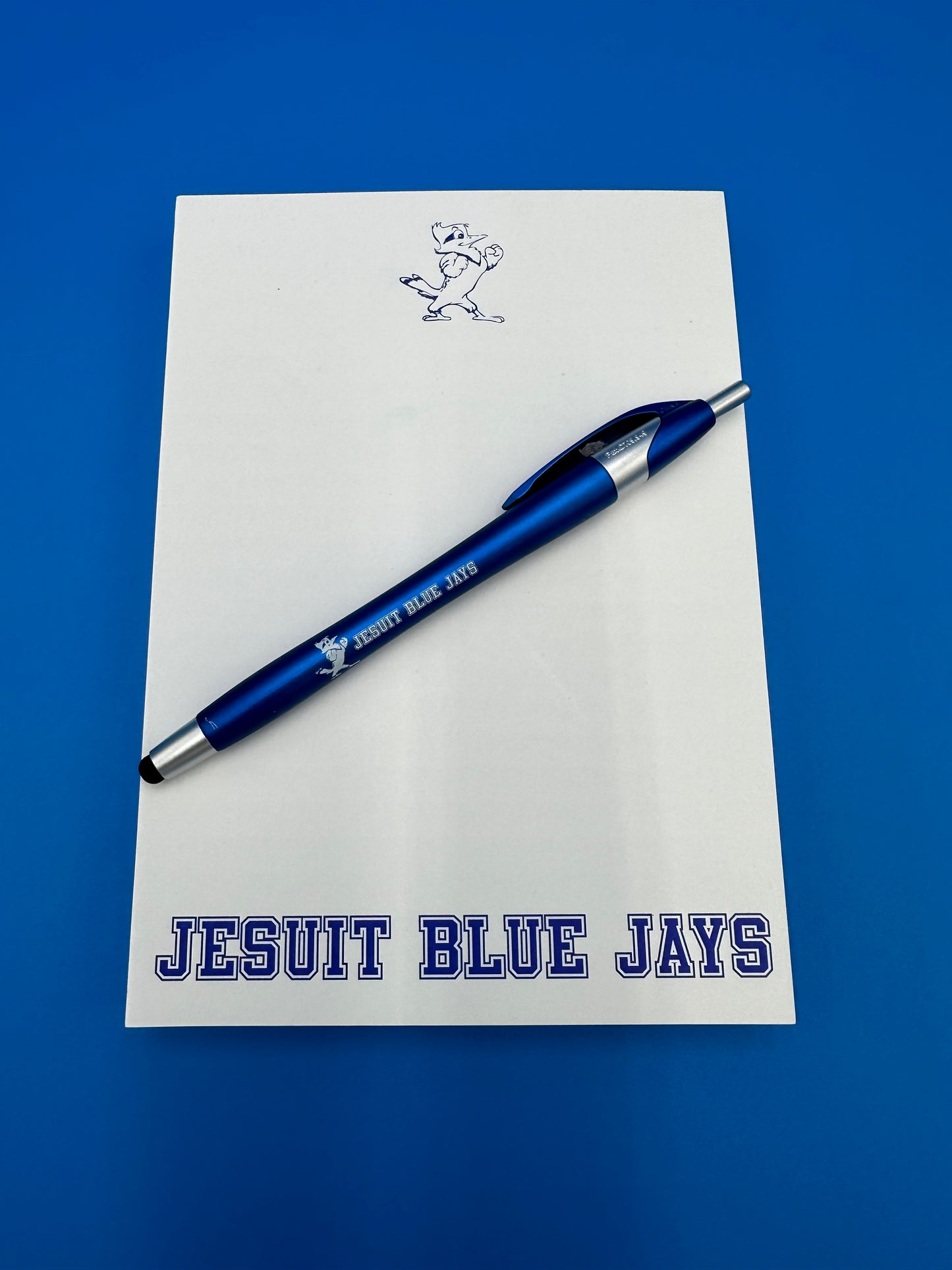5 x 7 Note Pad with Jesuit Pen.  Pad has 100 pages.