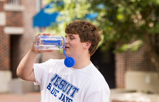 Nalgene.  32 oz. with fluid measurements on one side.  J Logo. Clear bottle with wide mouth. BPA/BPS free.