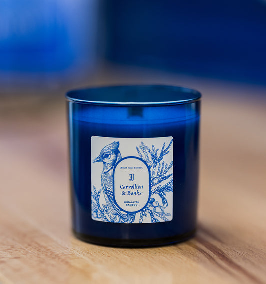 Wicks NOLA Candle Company. This sapphire blue translucent jar candle (9 ounces) has a burning time of 35-40 hours. The fragrance has a refreshing zest of aloe, lime and cantaloupe and mellows to delicate whispers of bamboo and green leaves. Custom Jesuit Scent: Himalayan Bamboo